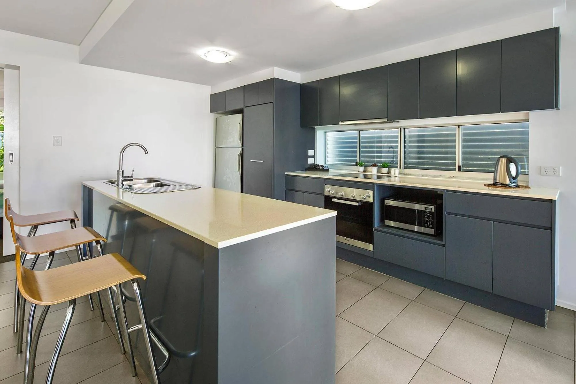 Kitchen or kitchenette in Azure Sea Whitsunday Resort