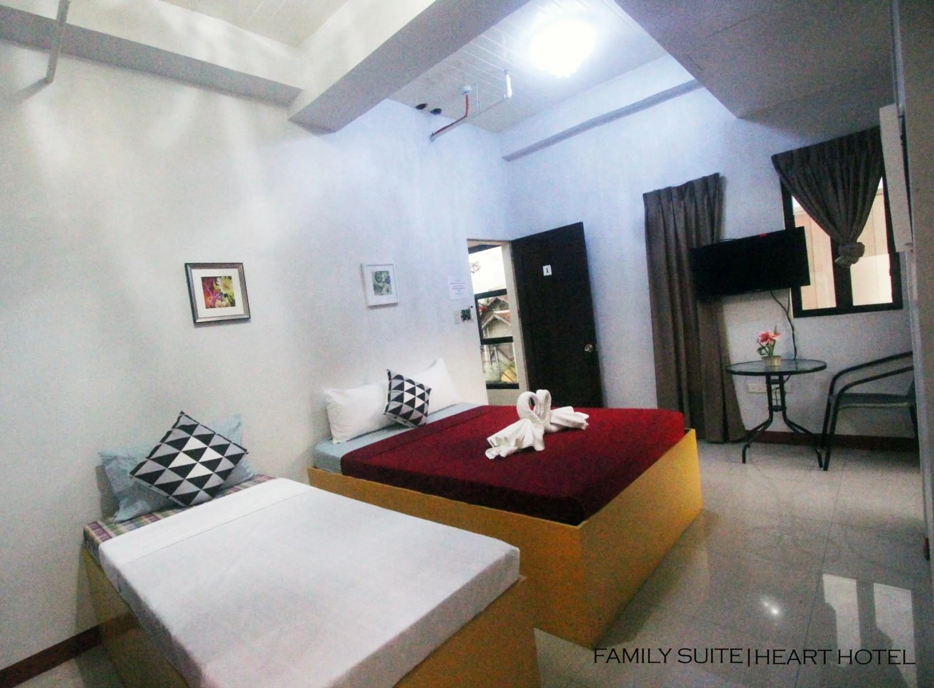 Bed in Heart Hotel and Services