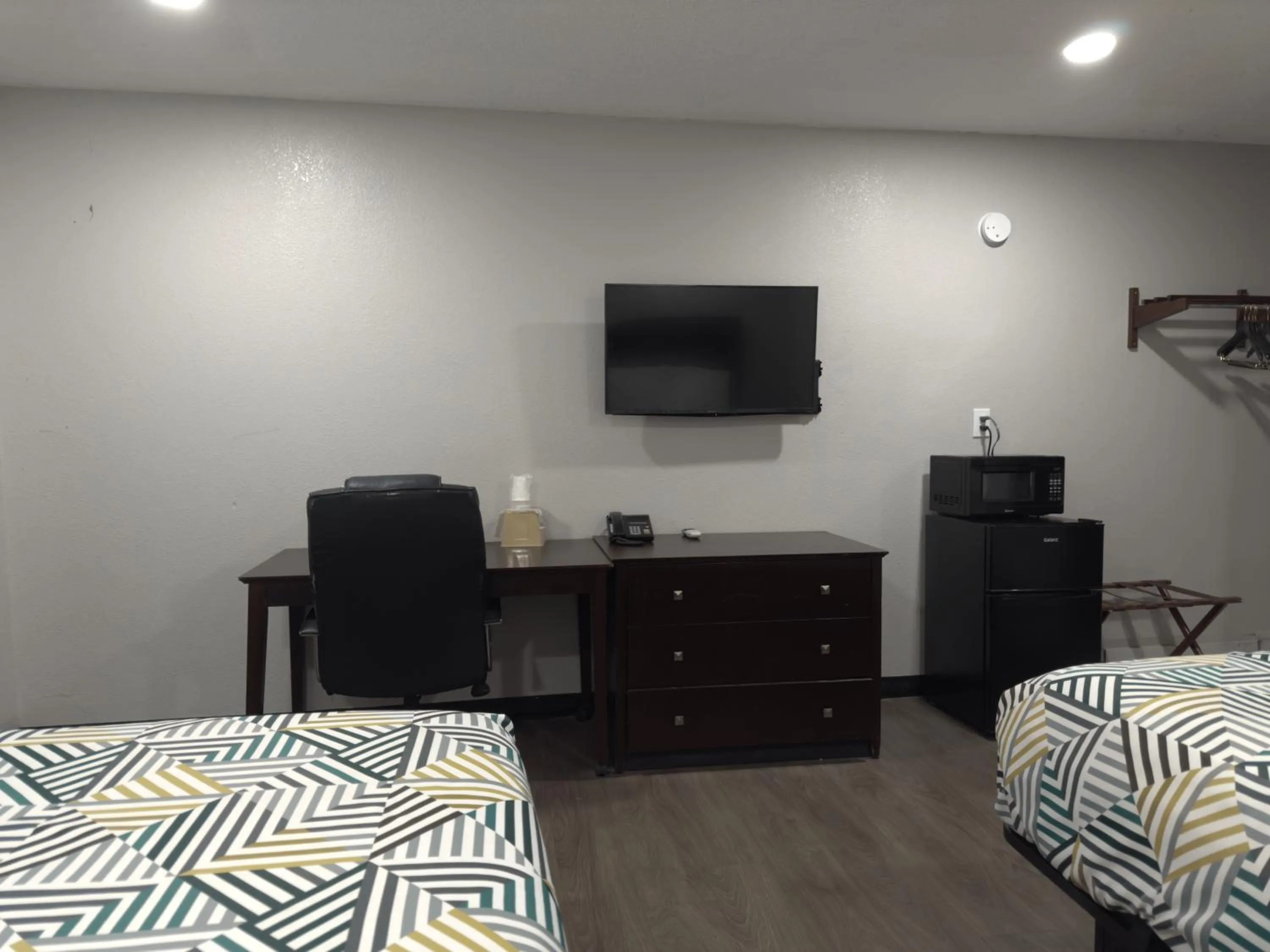 Bed in Relax Inn Mcgehee