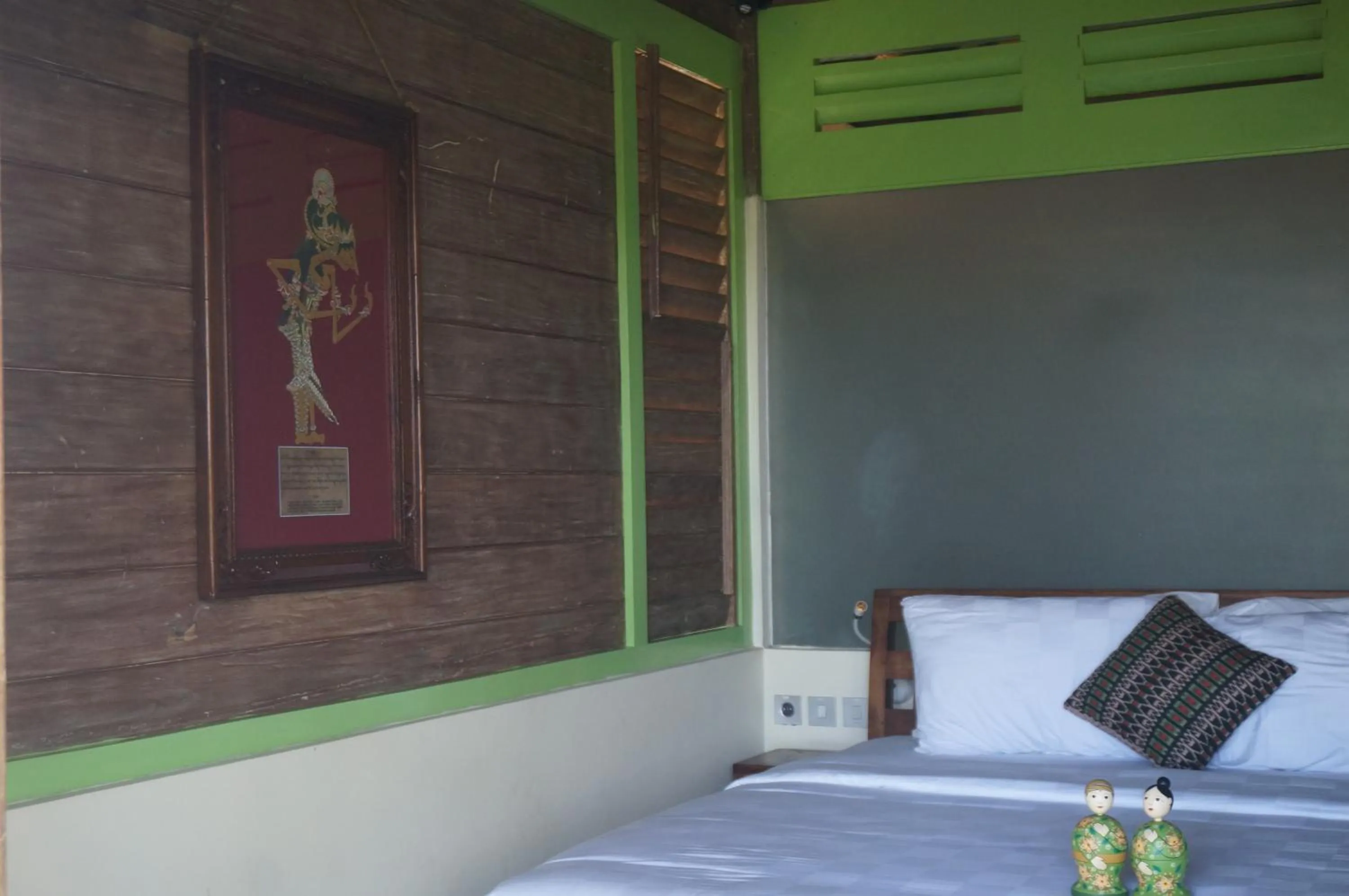 Bed in Manggis Garden Dive Resort