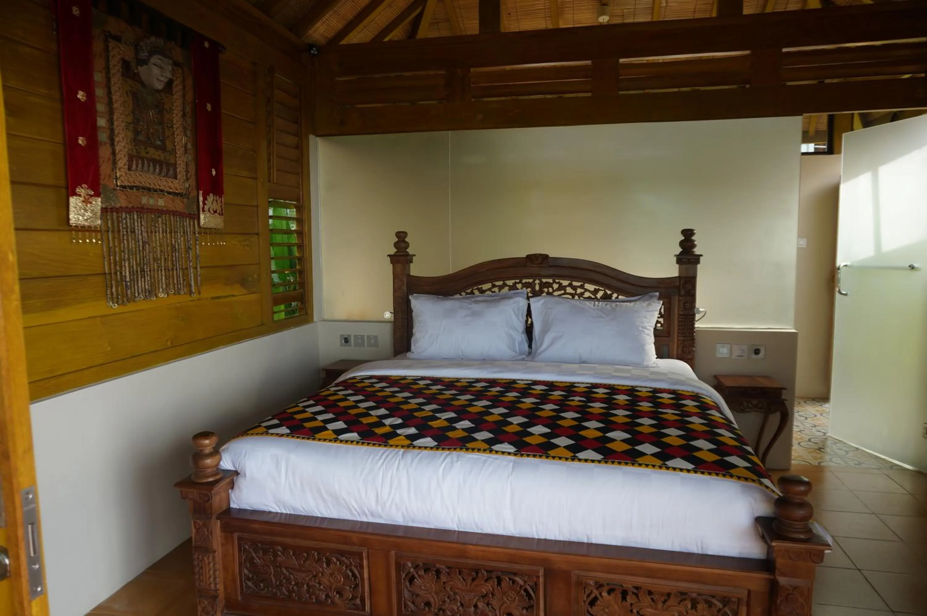 Bed in Manggis Garden Dive Resort