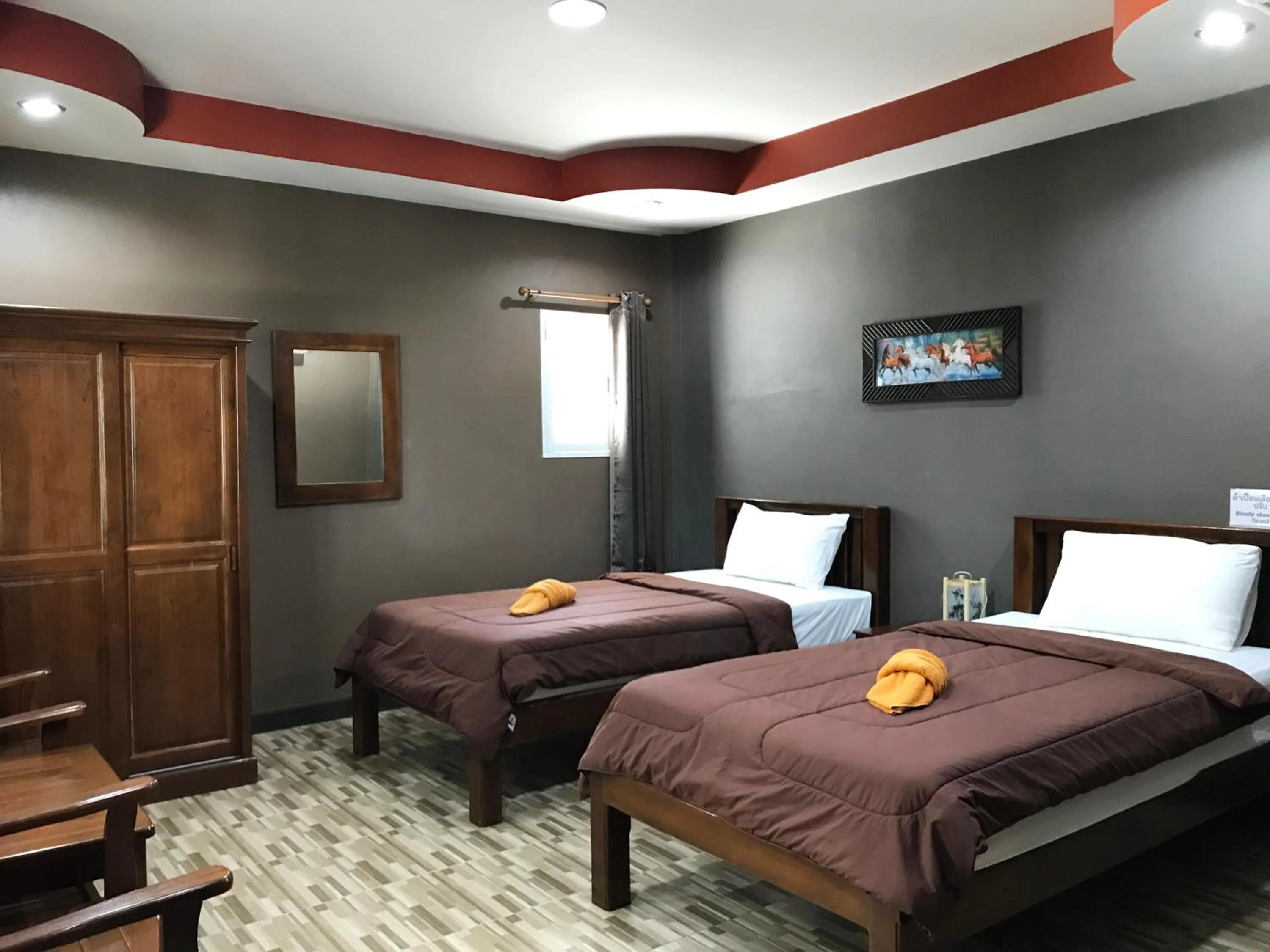 Photo of the whole room, Bed in Khwanruen Fishing Resort