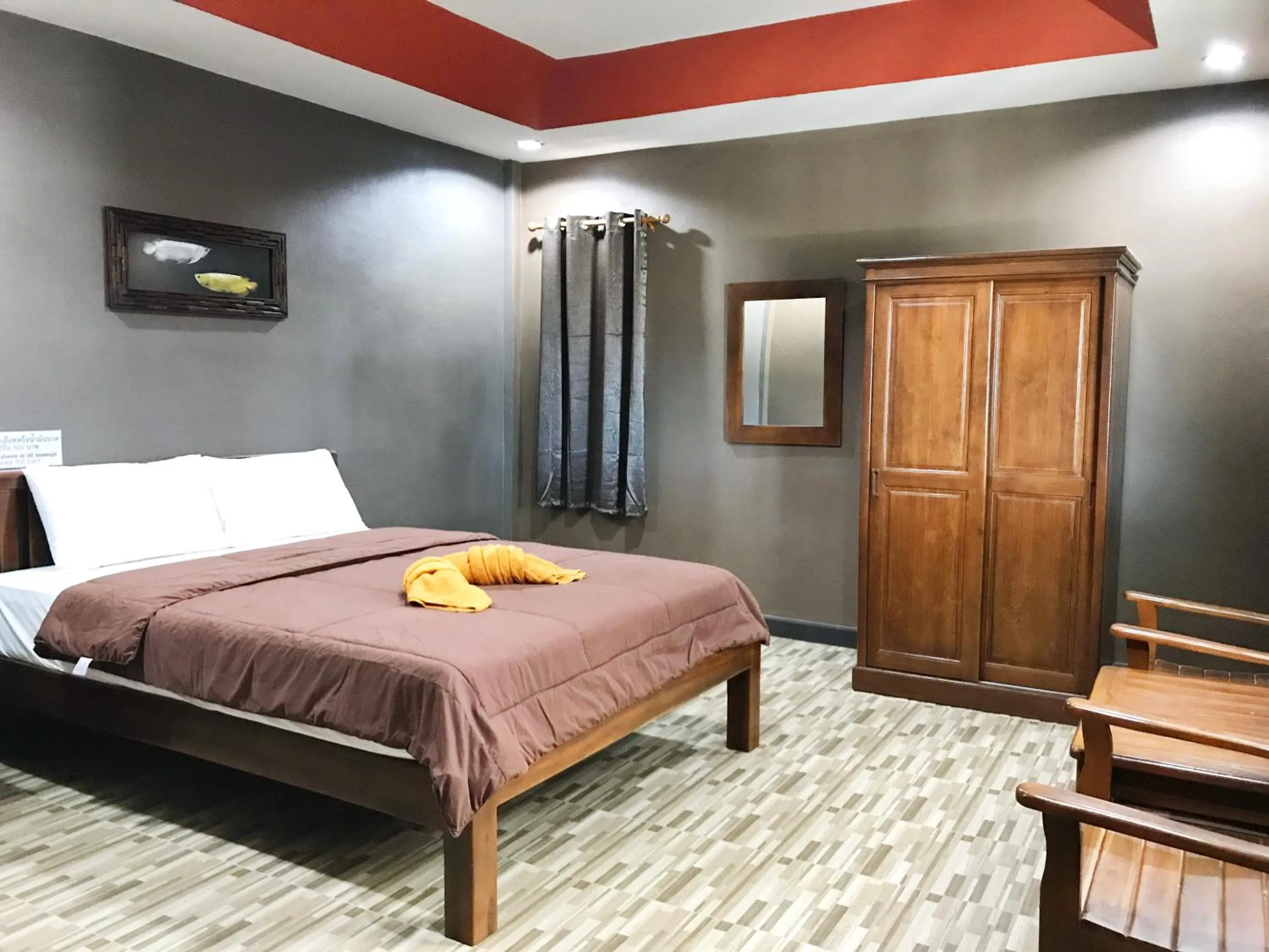 Photo of the whole room, Bed in Khwanruen Fishing Resort