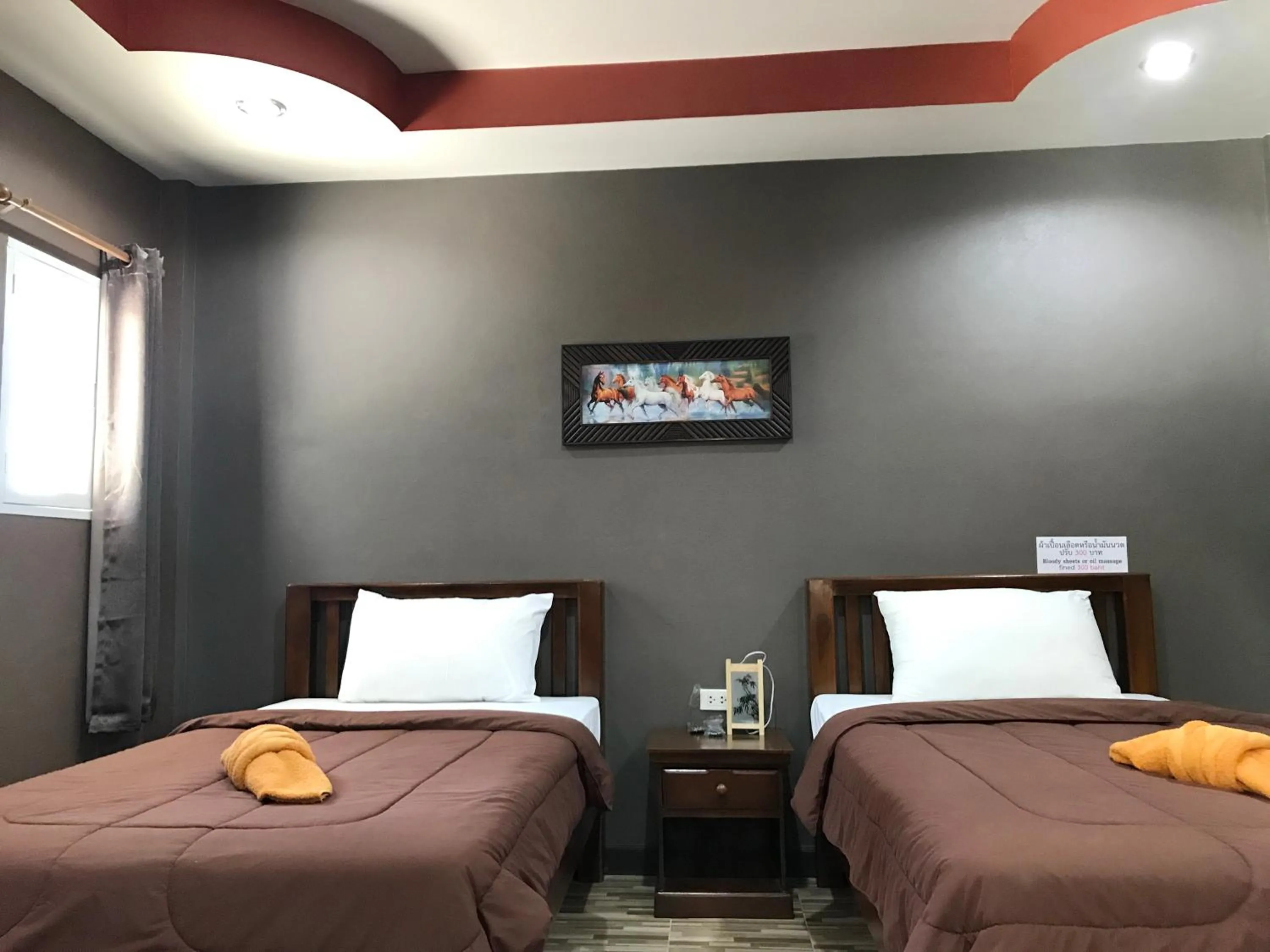 Photo of the whole room, Bed in Khwanruen Fishing Resort