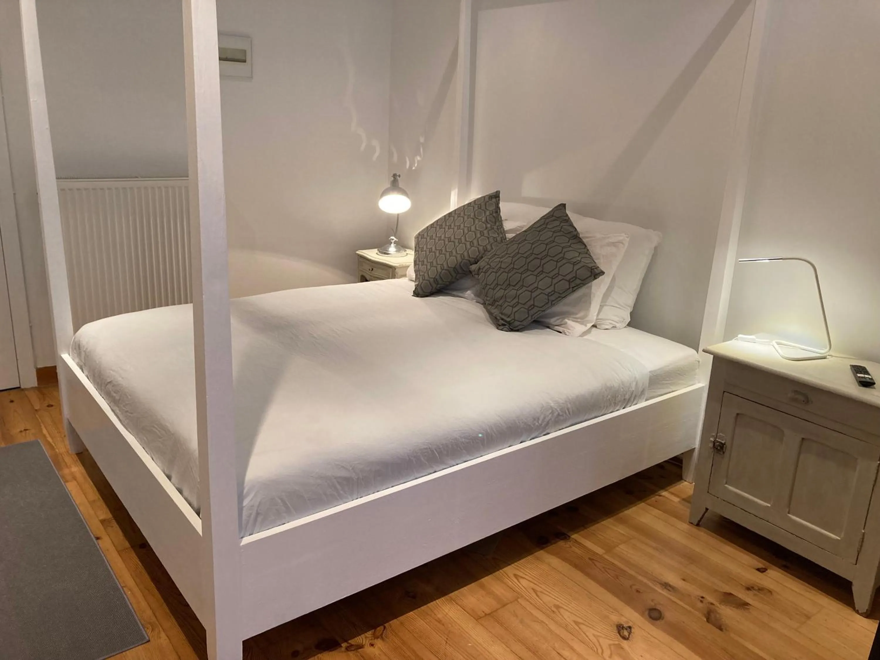 Bed in Simone's Kitchen B&B