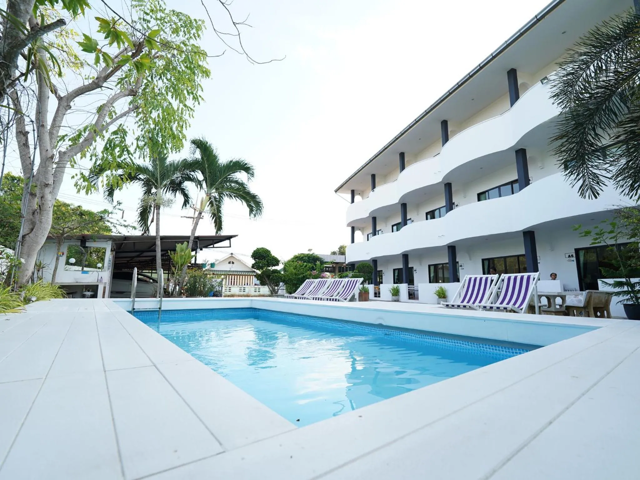 Swimming pool in RoomQuest One Bangsaray
