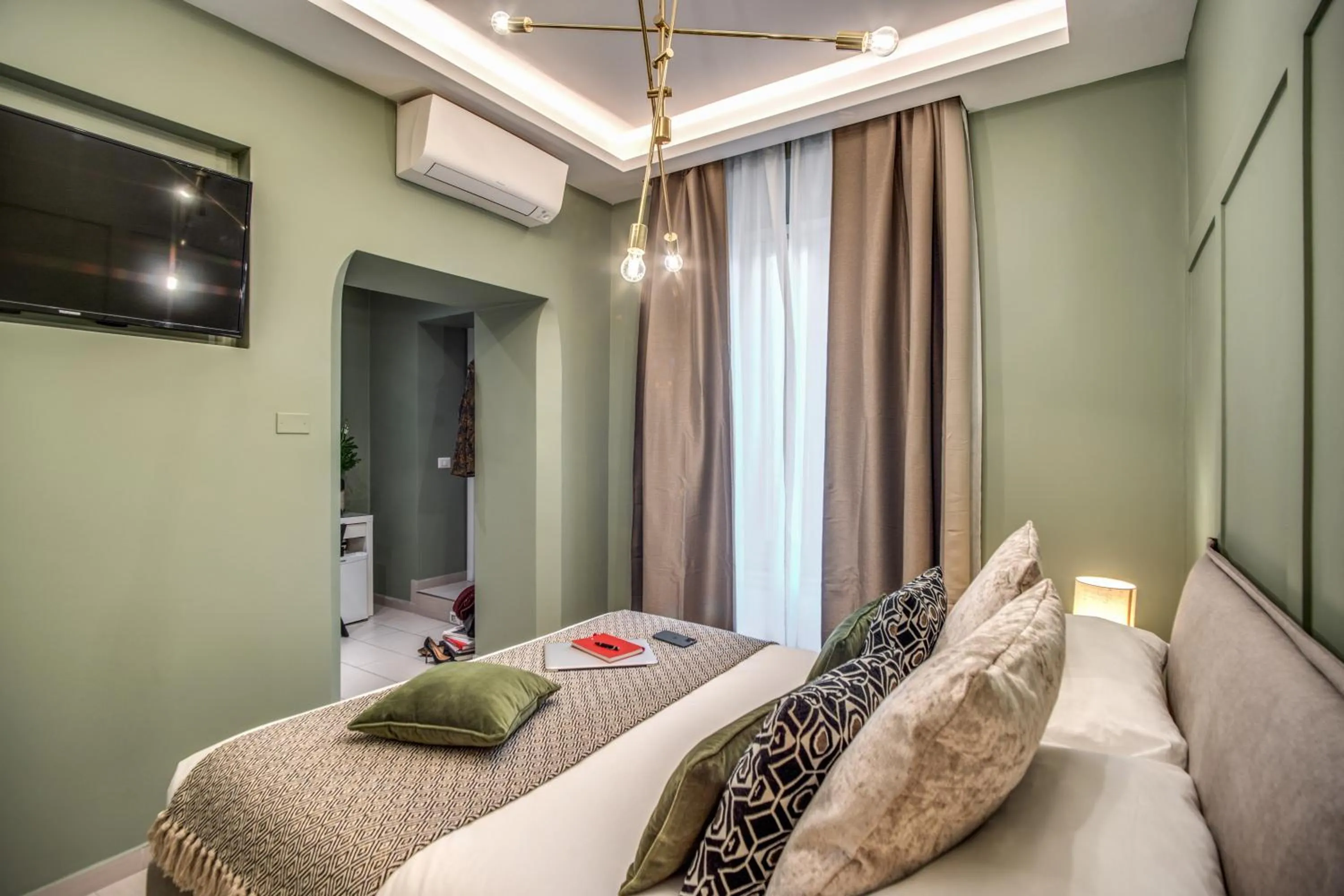 Bed in Borgognona Rooms