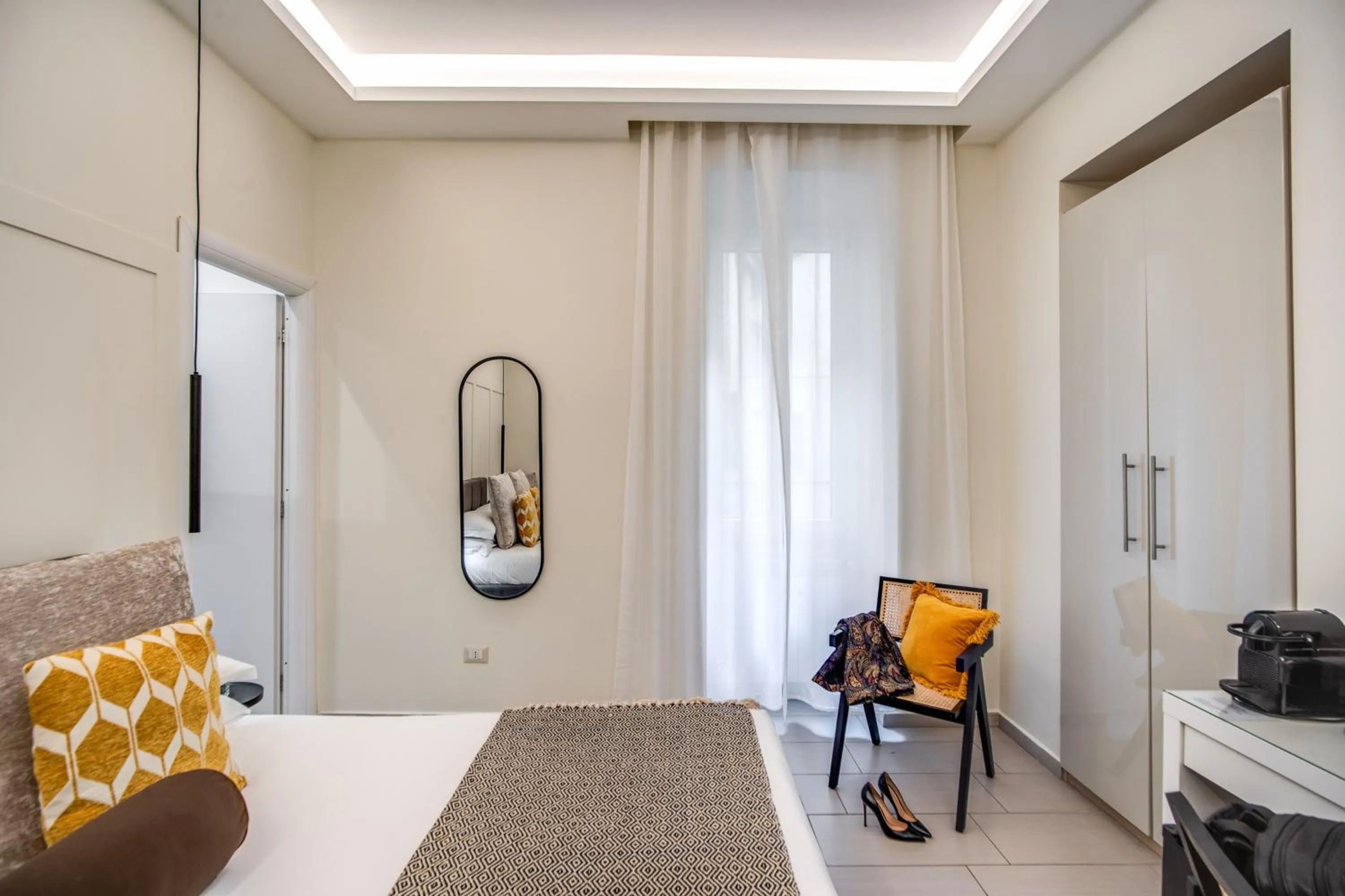 Bed in Borgognona Rooms