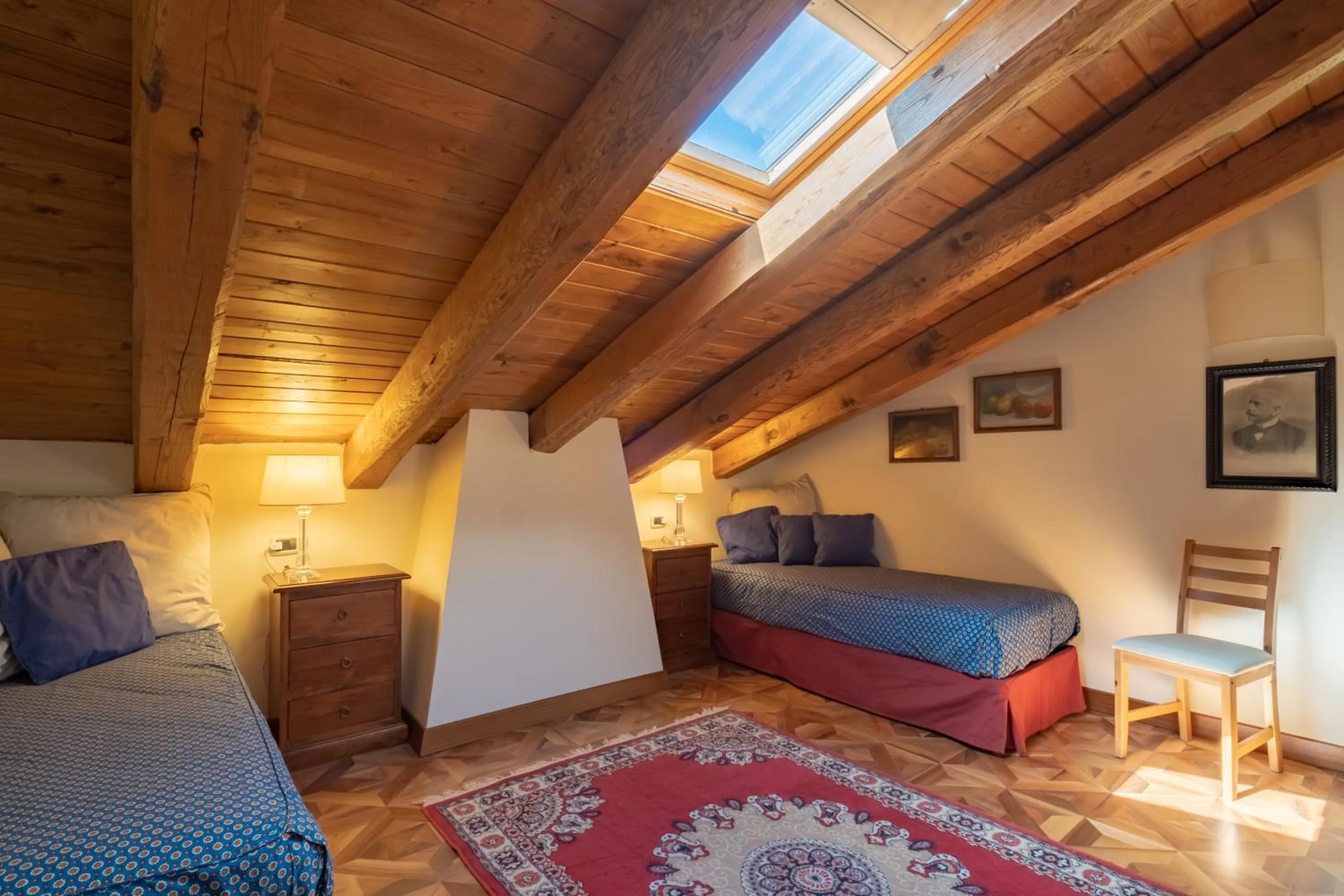 Seating area, Bed in BolognaRoomscom - La Quercia