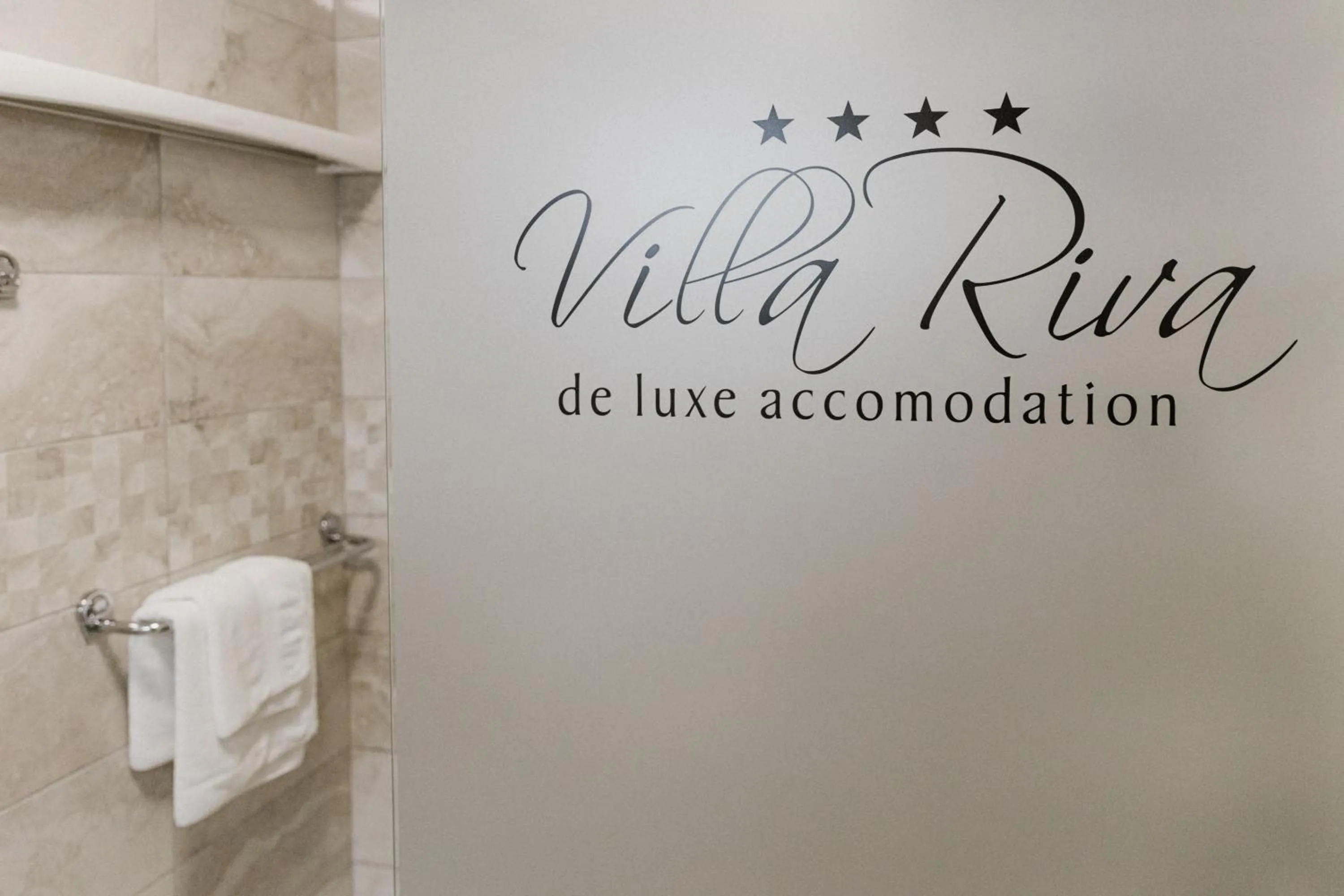 Property logo or sign in Villa Riva