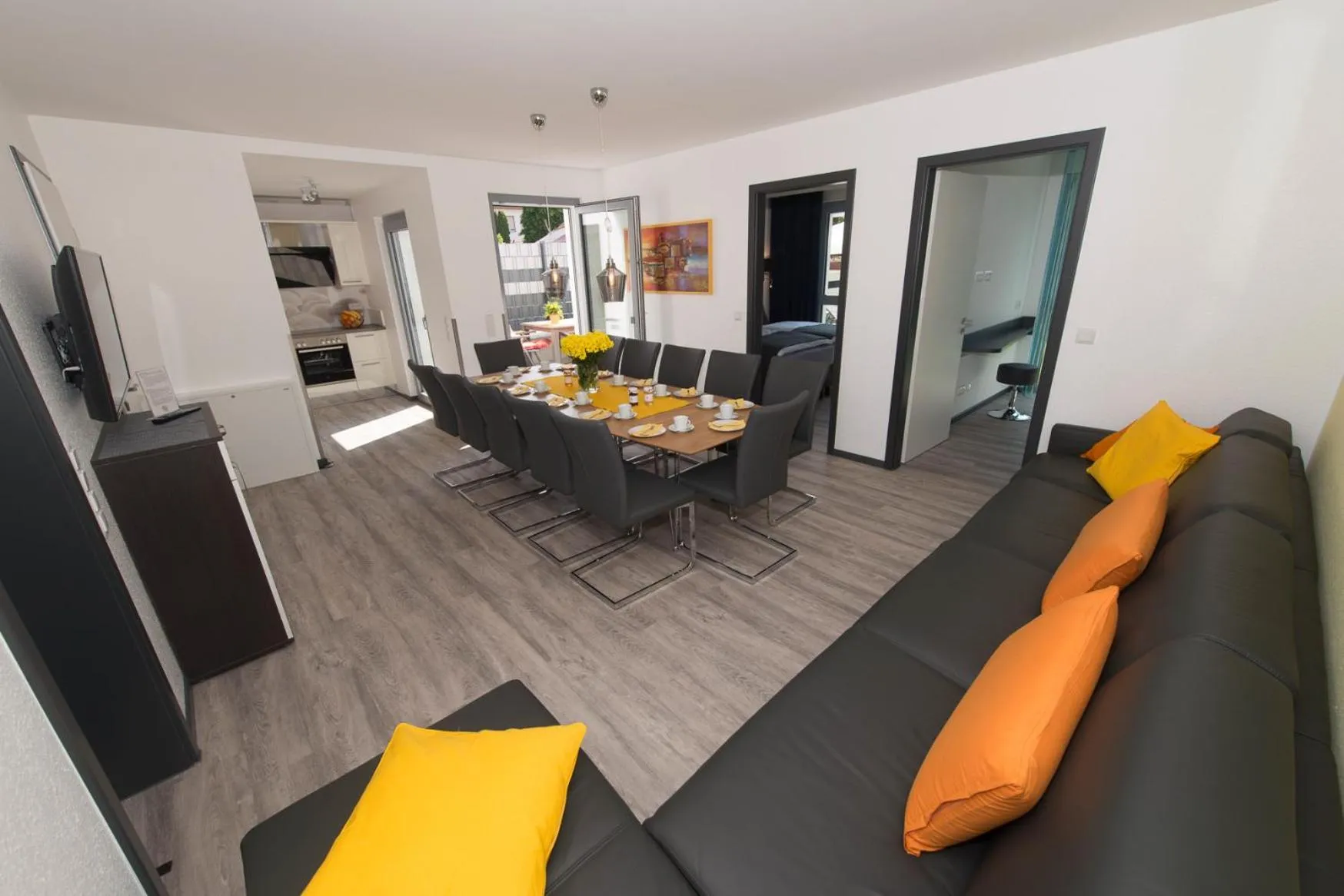 Communal lounge/ TV room in Design-Apartments by Ulrike Horster