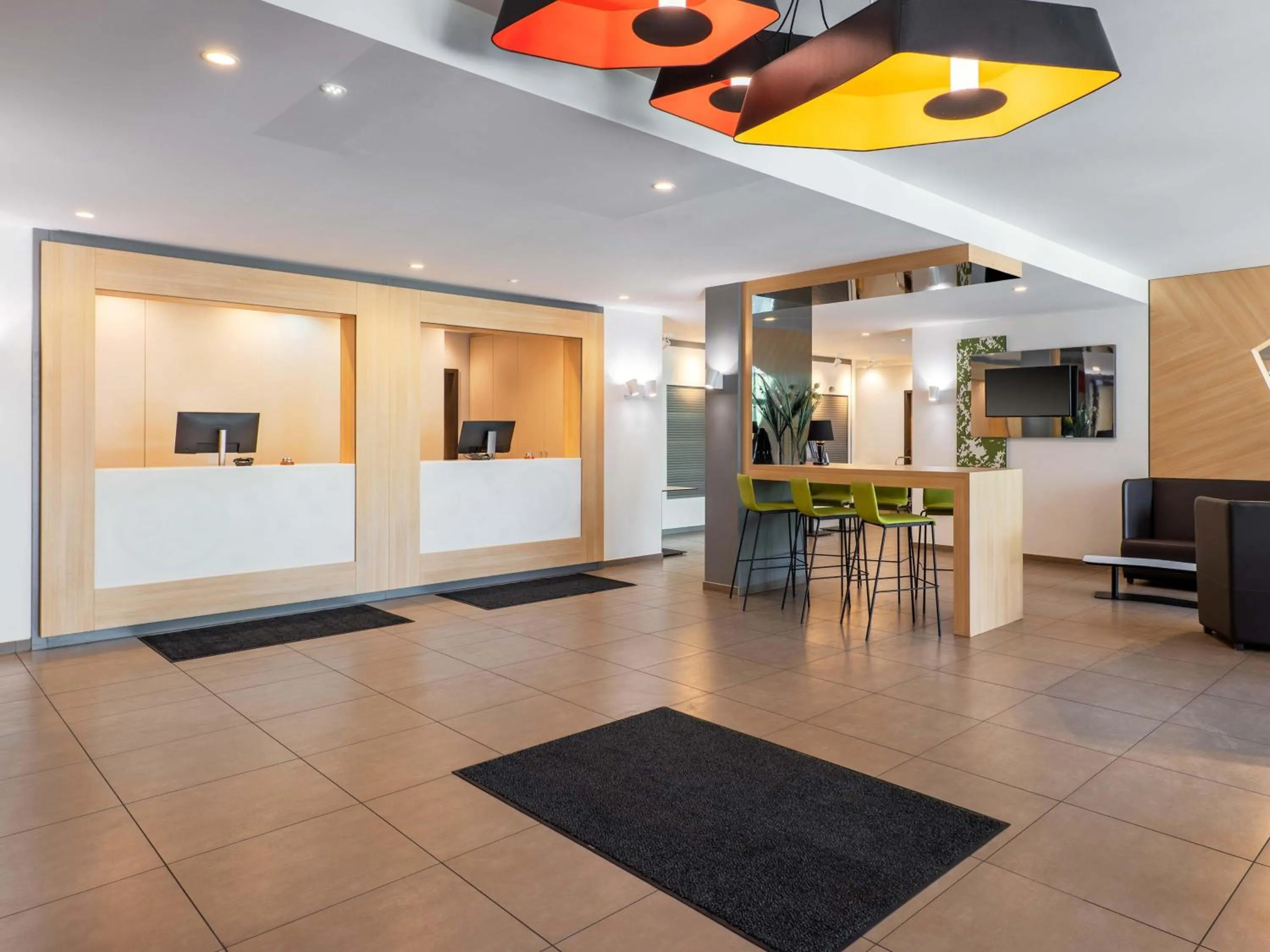 Lobby or reception in B&B Hotel Offenburg-City