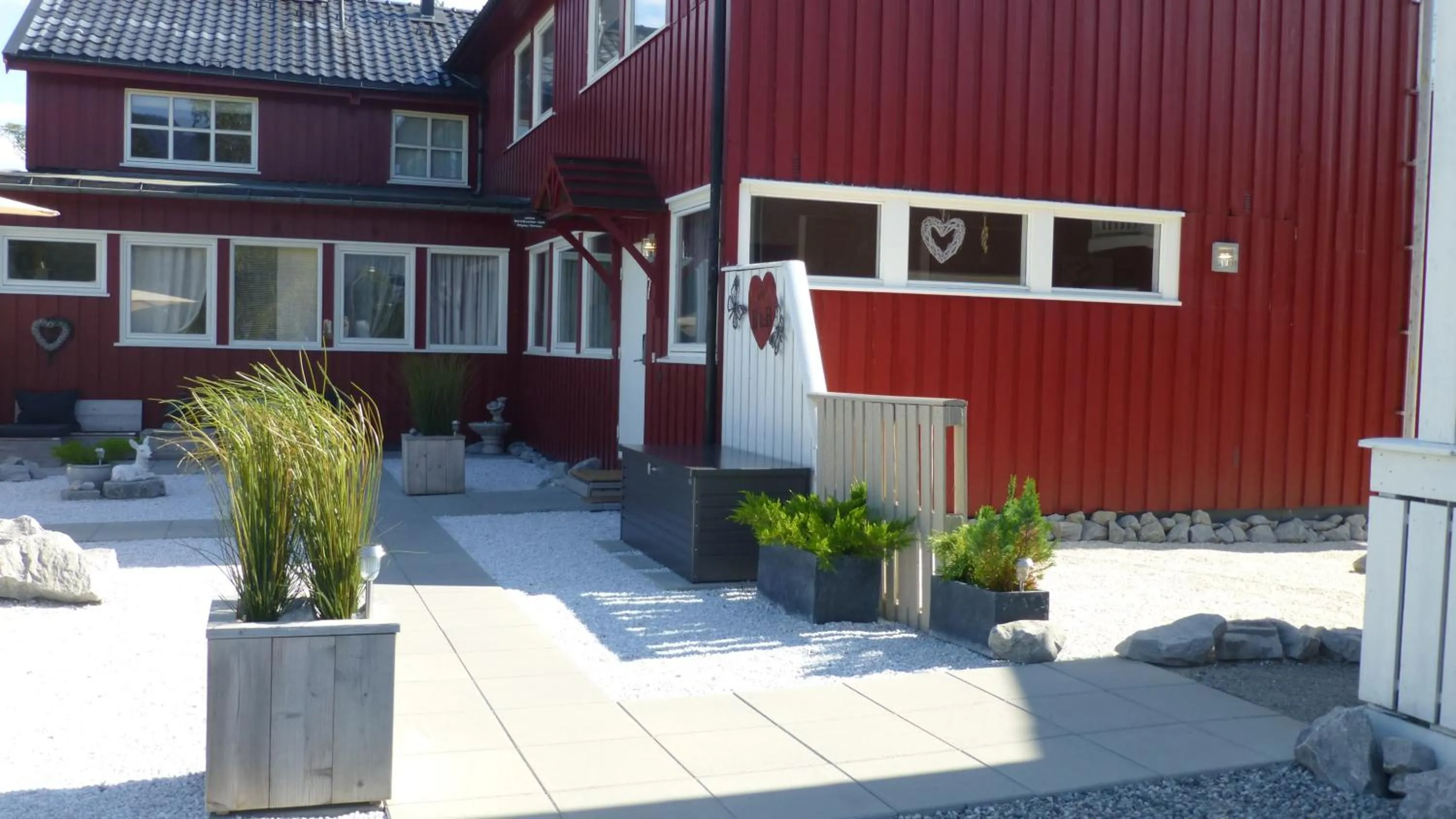 Garden in Løvheim Gjestehus - Anneks