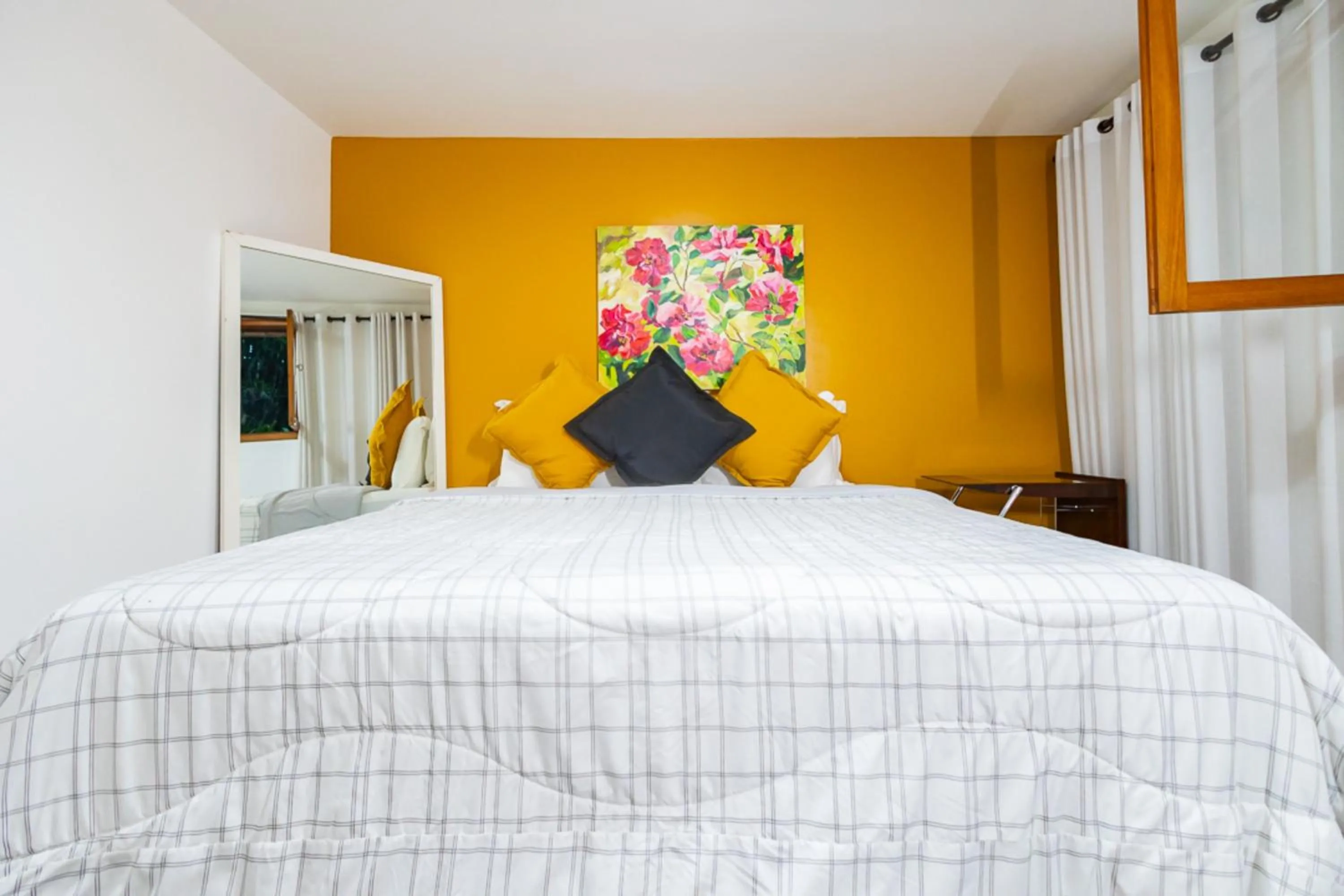 Bedroom, Bed in Putini Pousada e Hotel by OYO