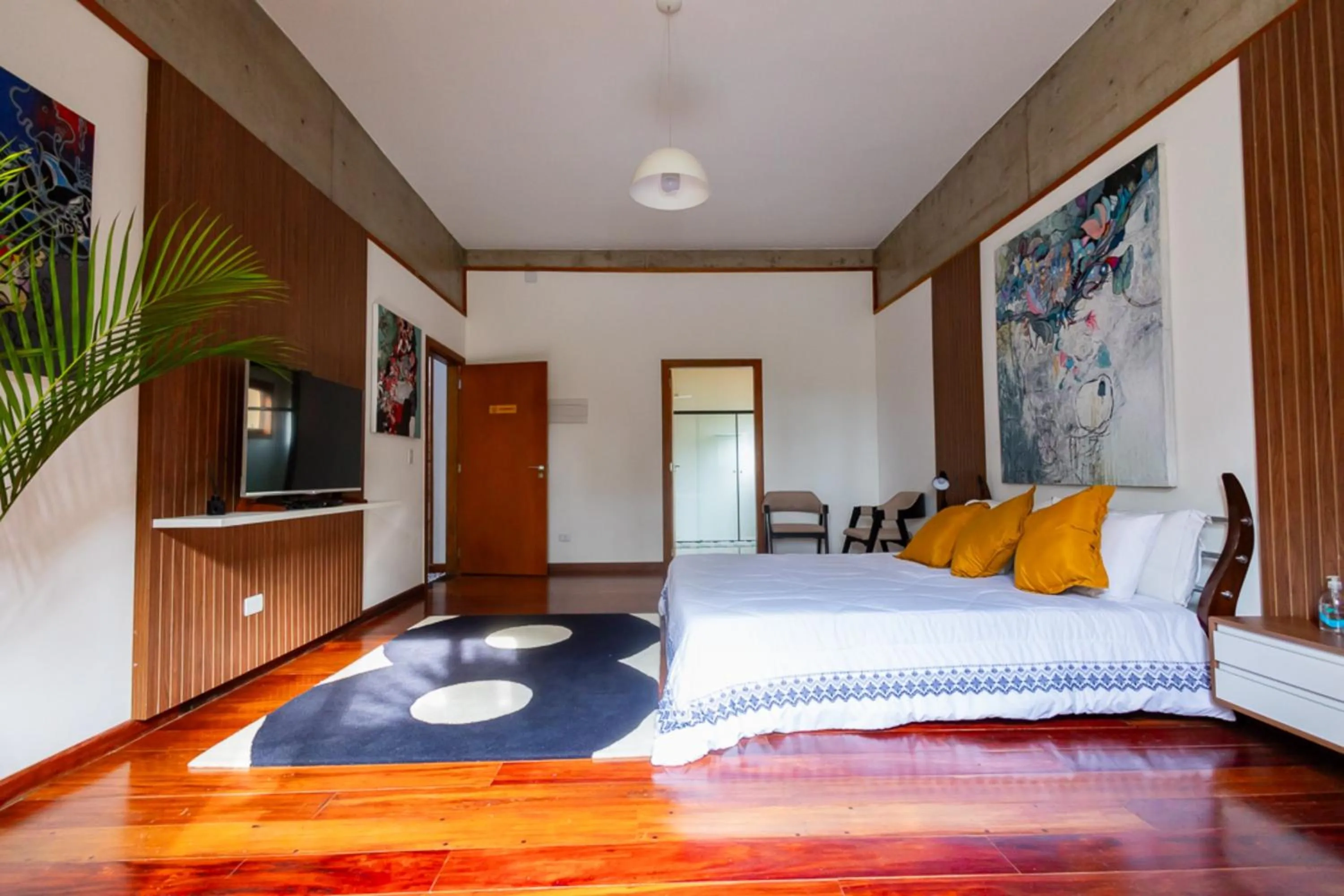 Bedroom in Putini Pousada e Hotel by OYO