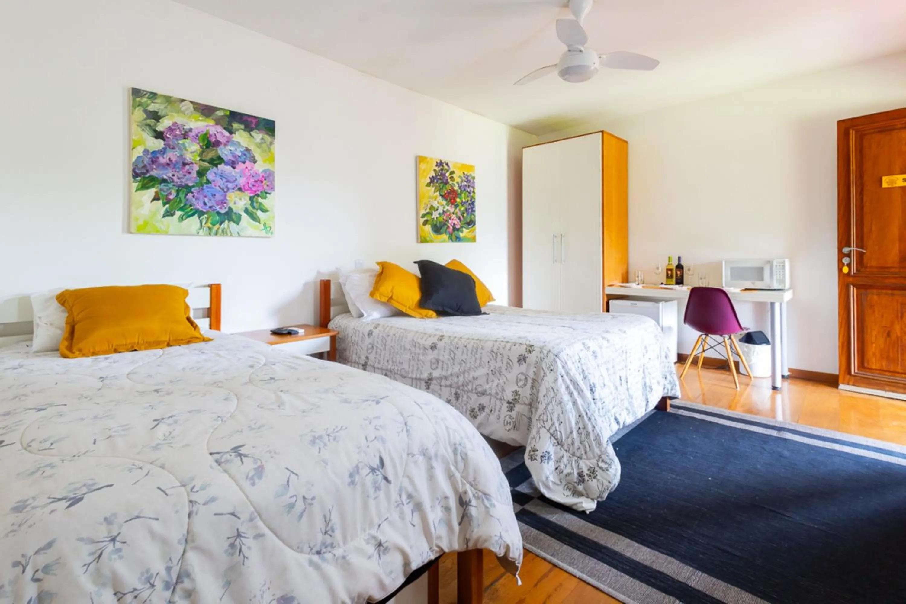 Bedroom, Bed in Putini Pousada e Hotel by OYO