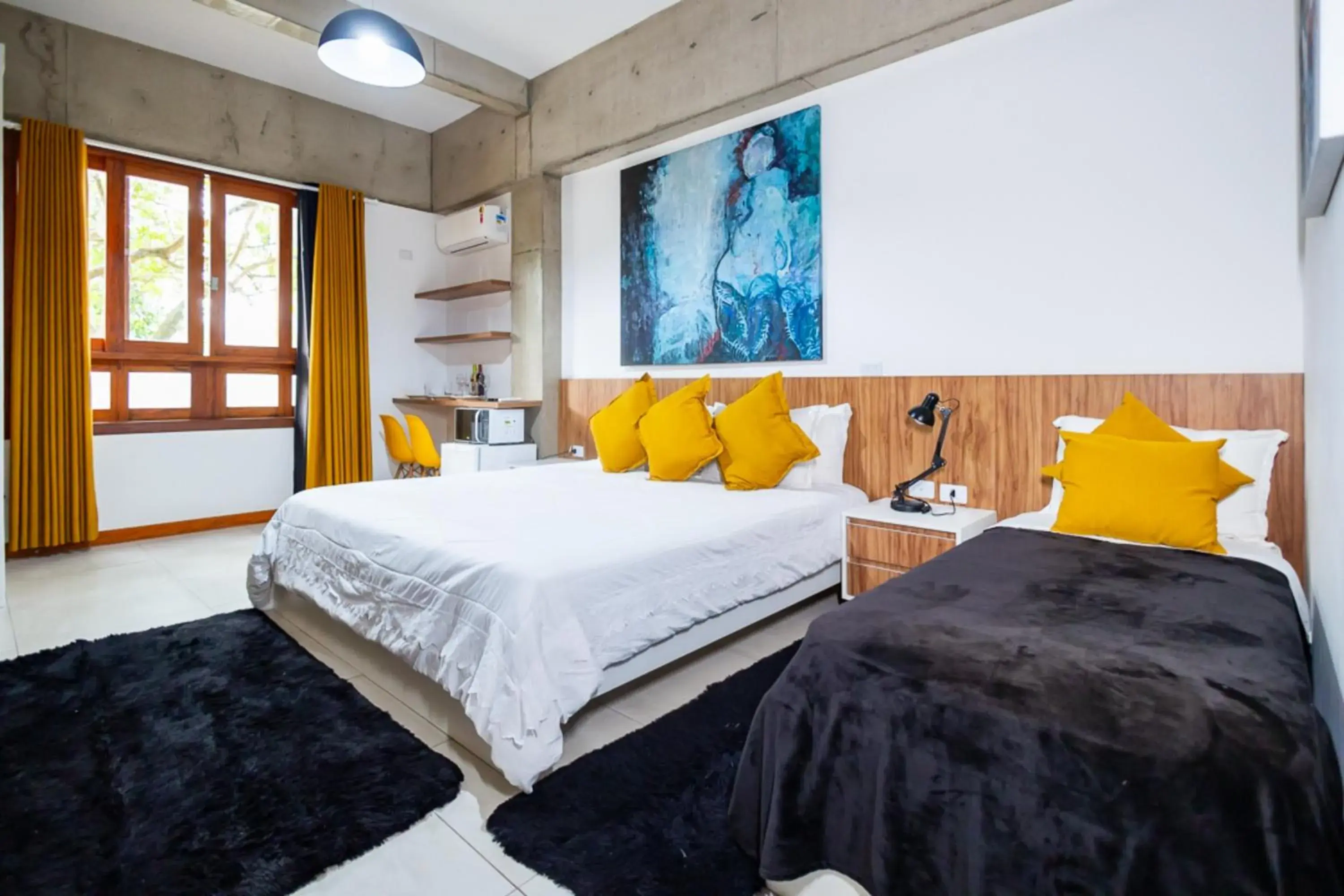 Superior Triple Room (1 Double bed + 1 Single bed) in Putini Pousada e Hotel by OYO Superior Triple Room (1 Double bed + 1 Single bed) in Putini Pousada e Hotel by OYO