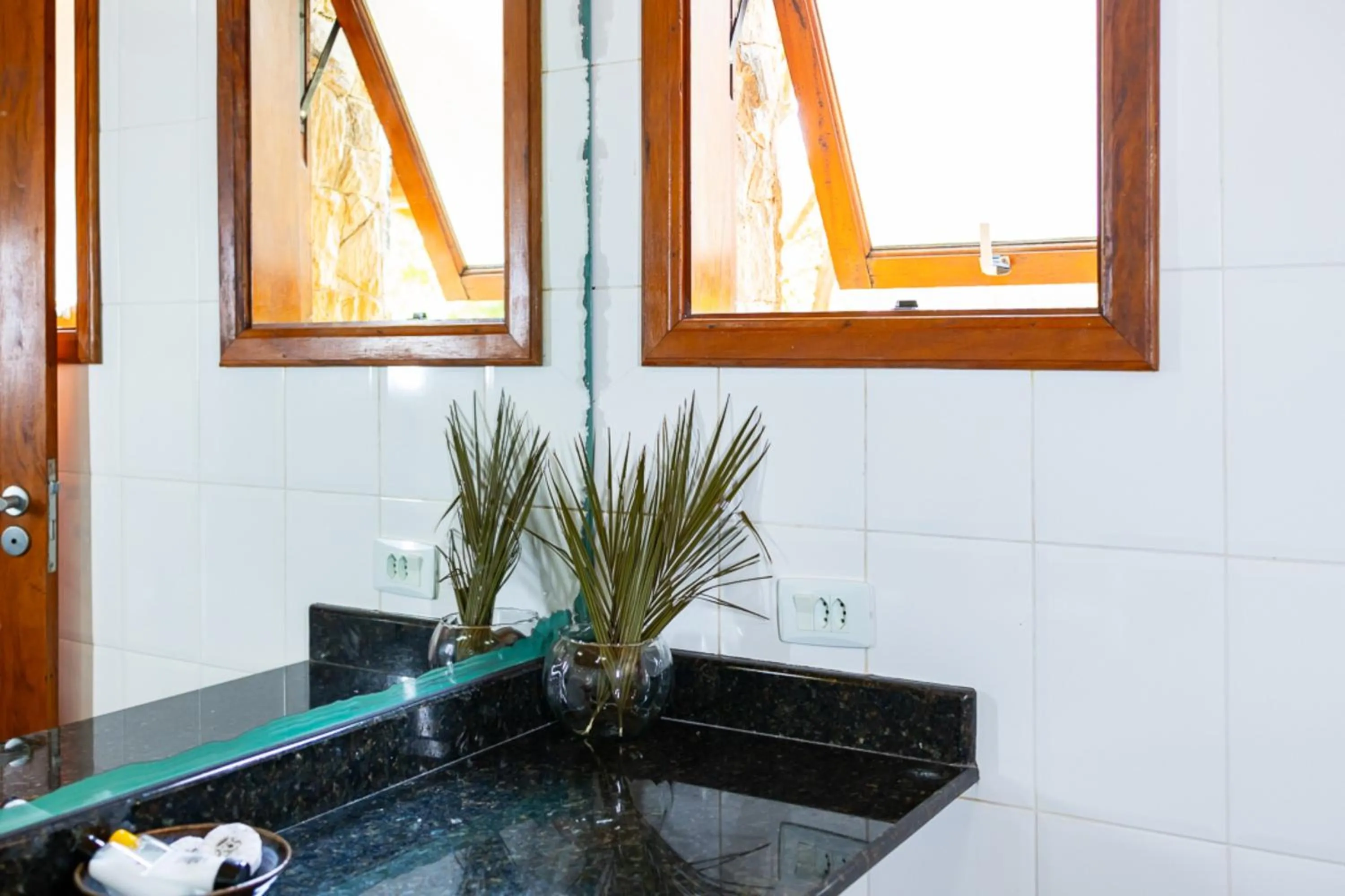 Bathroom in Putini Pousada e Hotel by OYO