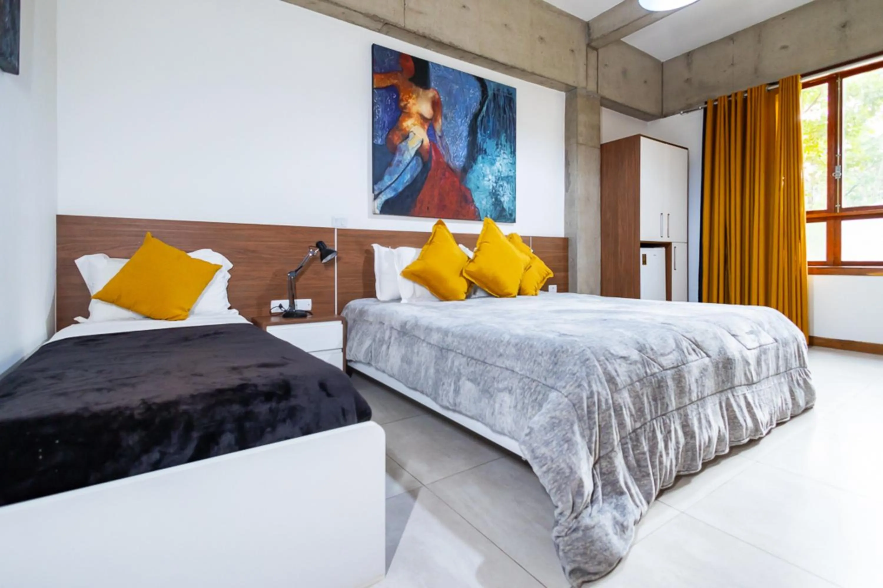 Bedroom, Bed in Putini Pousada e Hotel by OYO