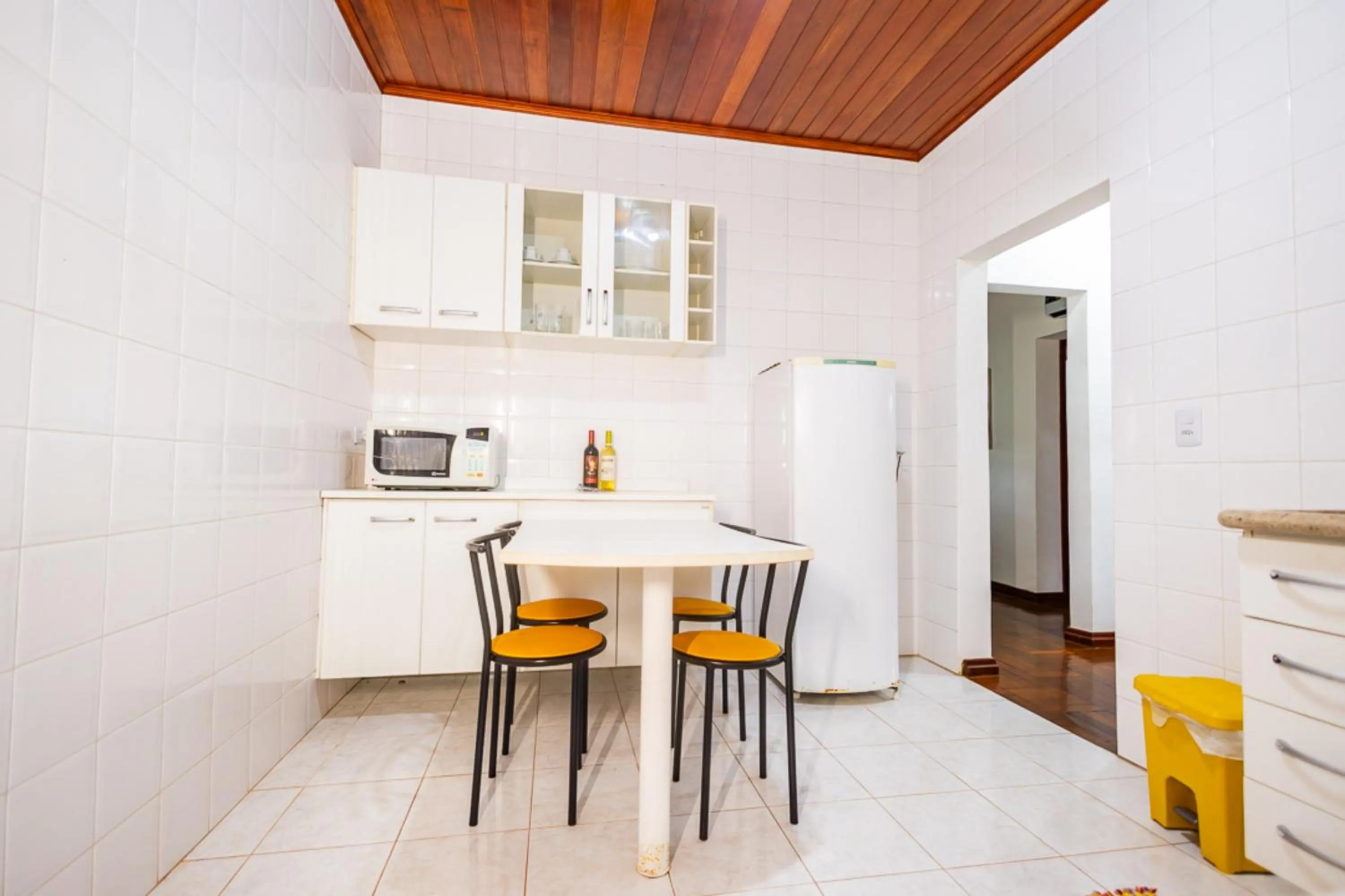 Kitchen or kitchenette in Putini Pousada e Hotel by OYO