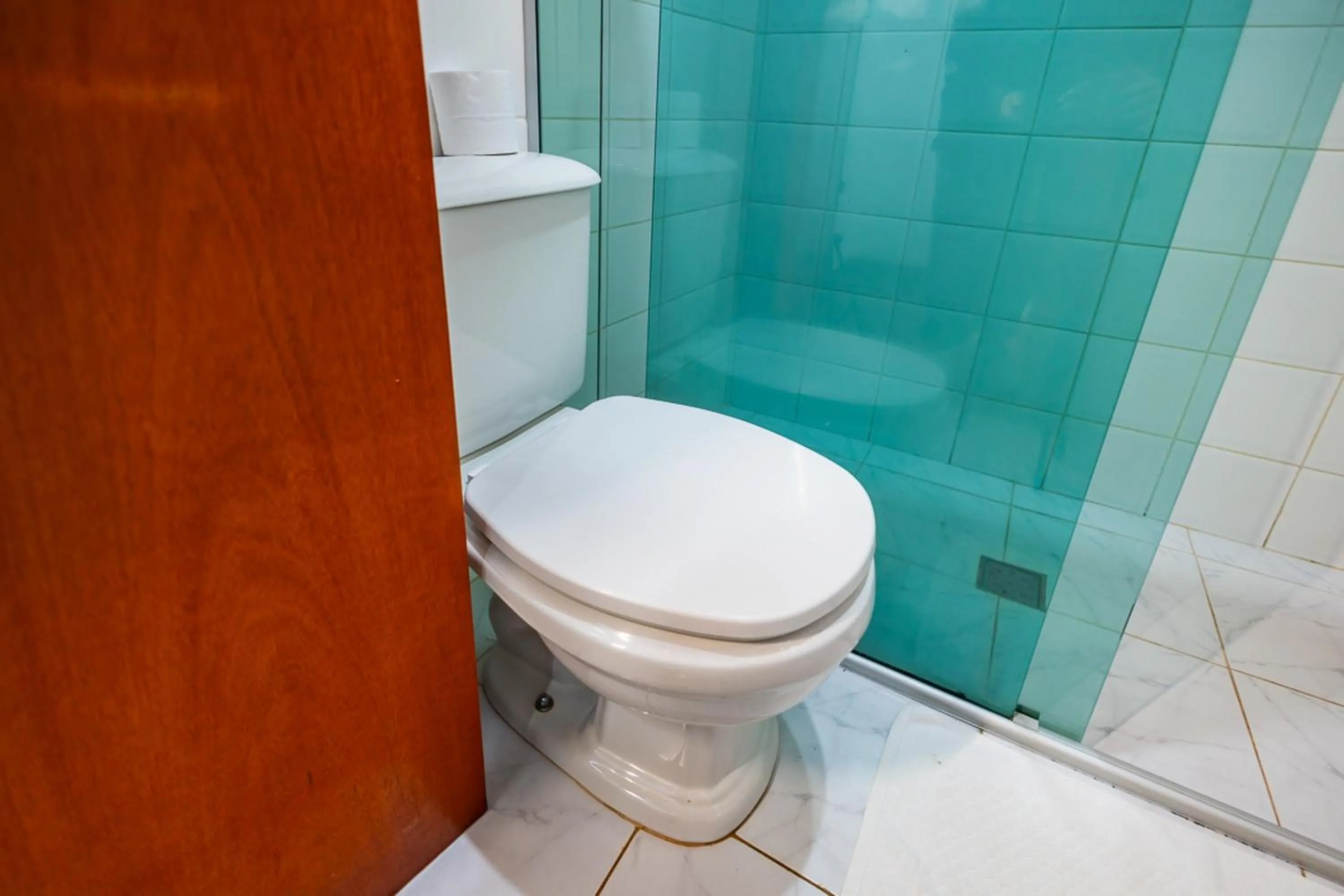 Bathroom in Putini Pousada e Hotel by OYO