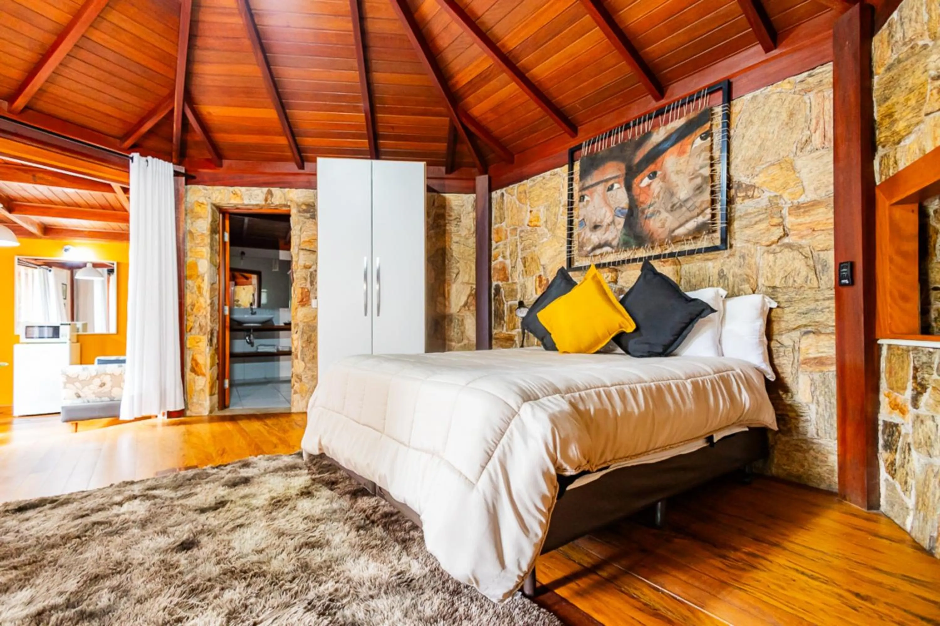 Bedroom, Bed in Putini Pousada e Hotel by OYO