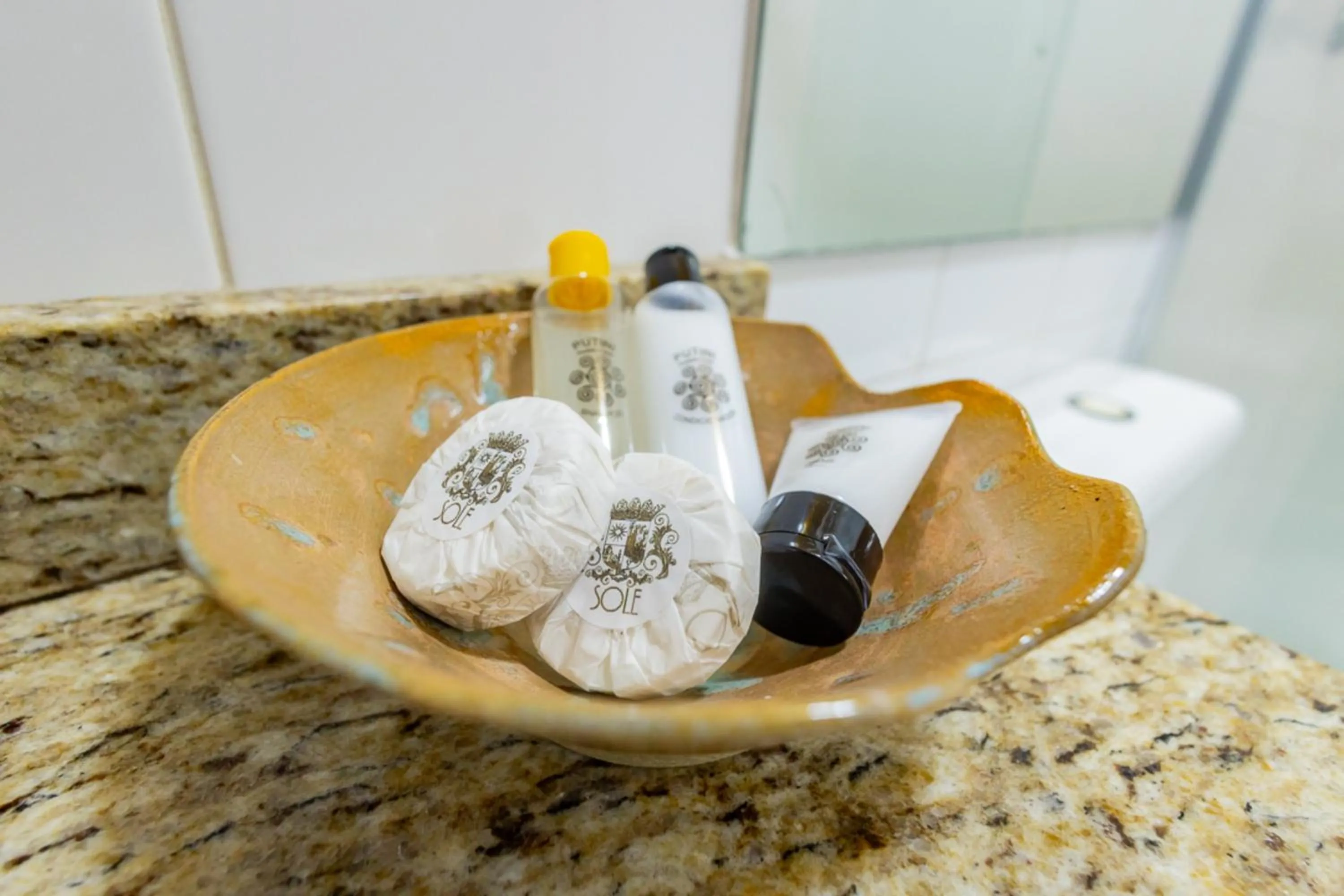 Bathroom in Putini Pousada e Hotel by OYO