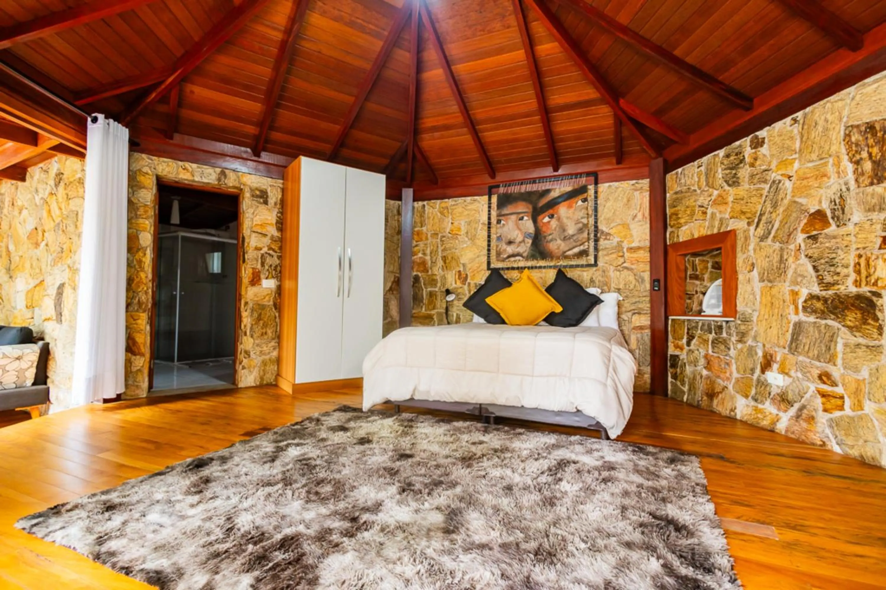 Bedroom, Bed in Putini Pousada e Hotel by OYO