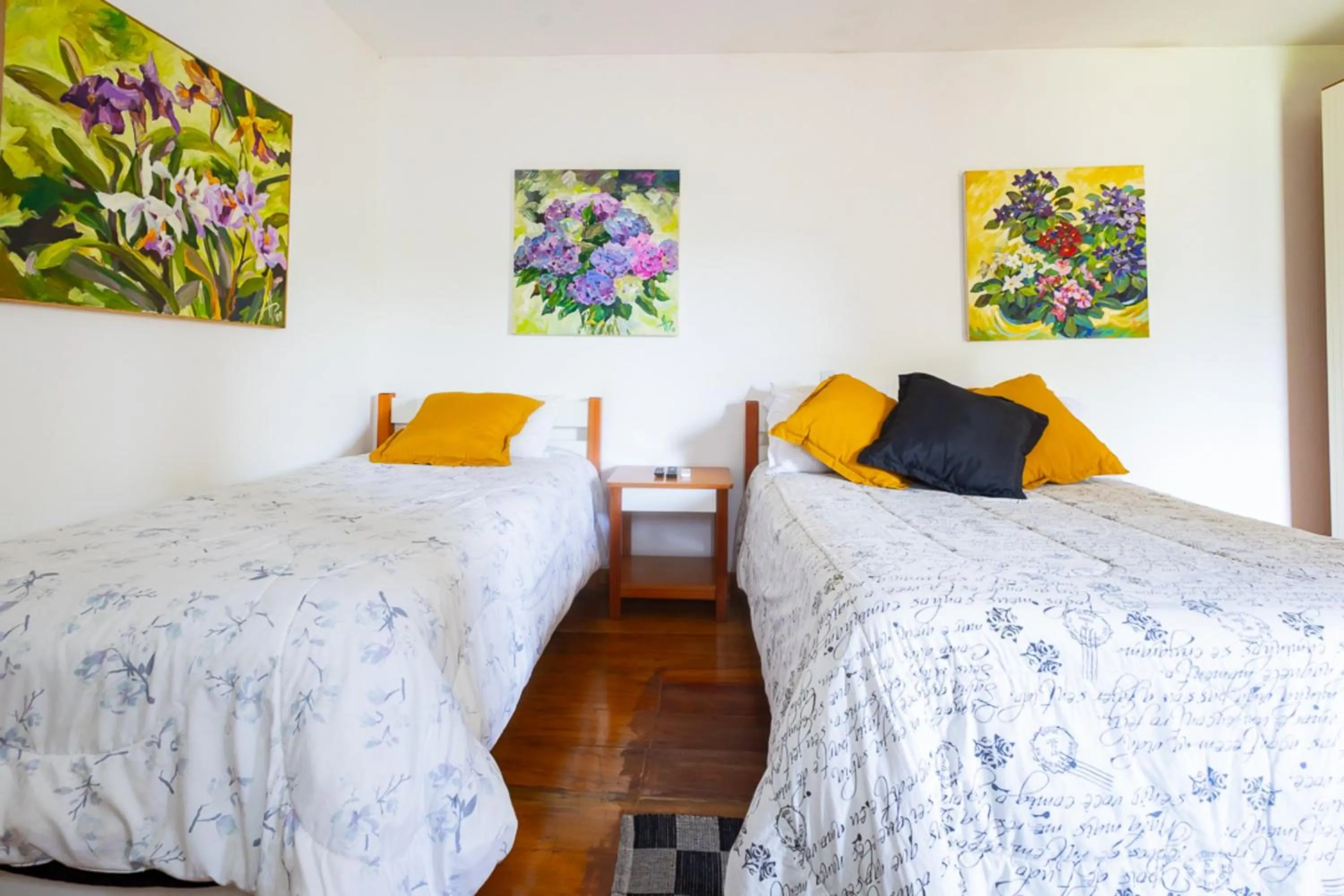 Bedroom, Bed in Putini Pousada e Hotel by OYO