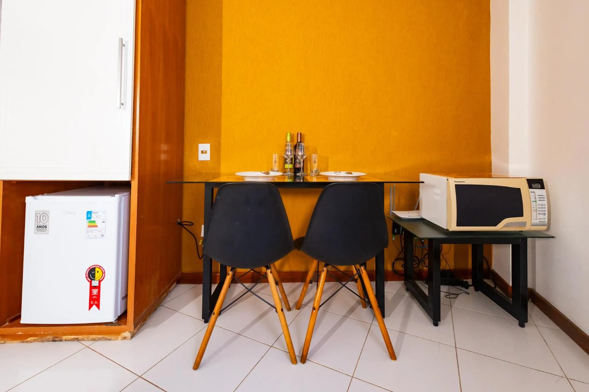 Dining area in Putini Pousada e Hotel by OYO