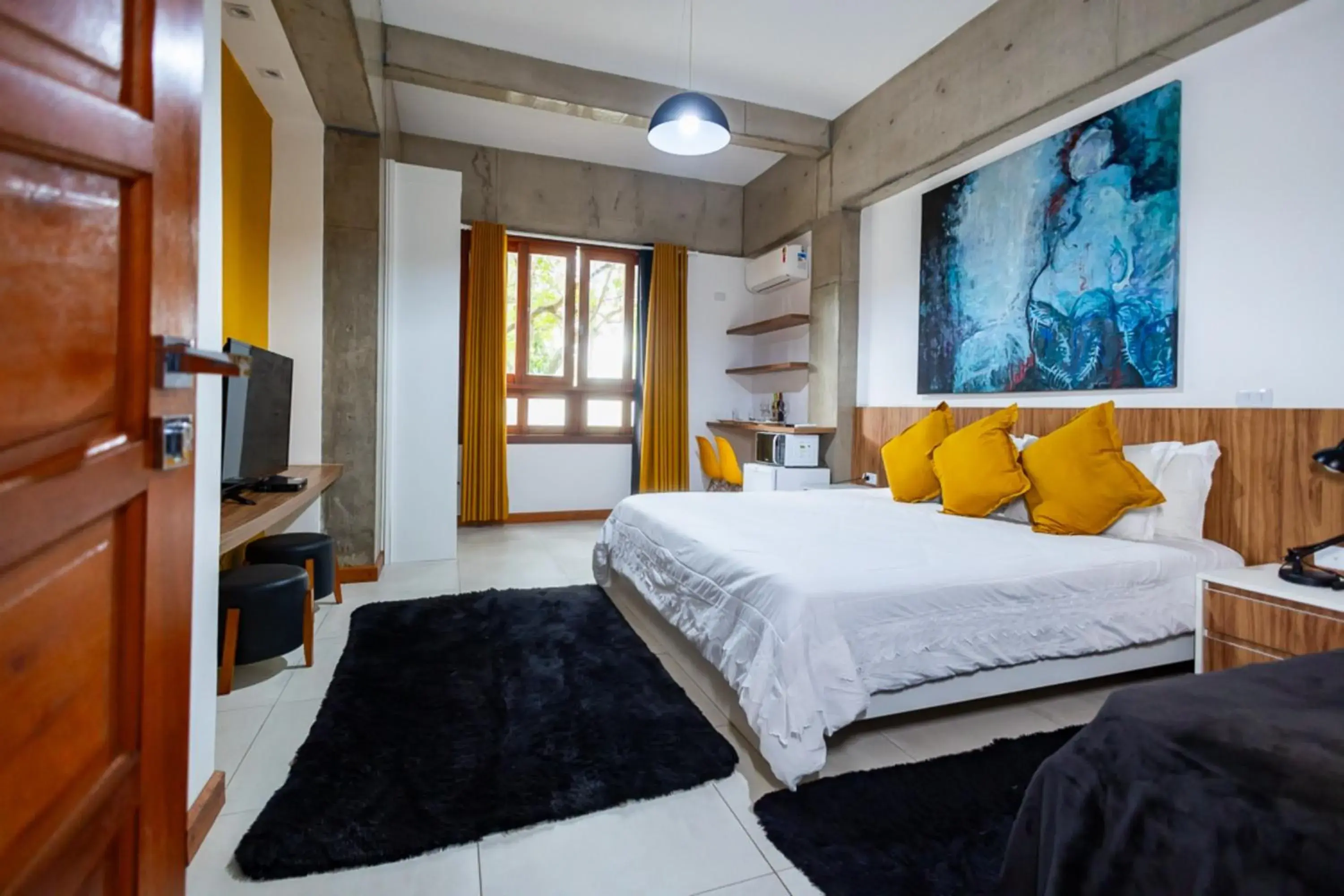 Superior Triple Room in Putini Pousada e Hotel by OYO Superior Triple Room in Putini Pousada e Hotel by OYO