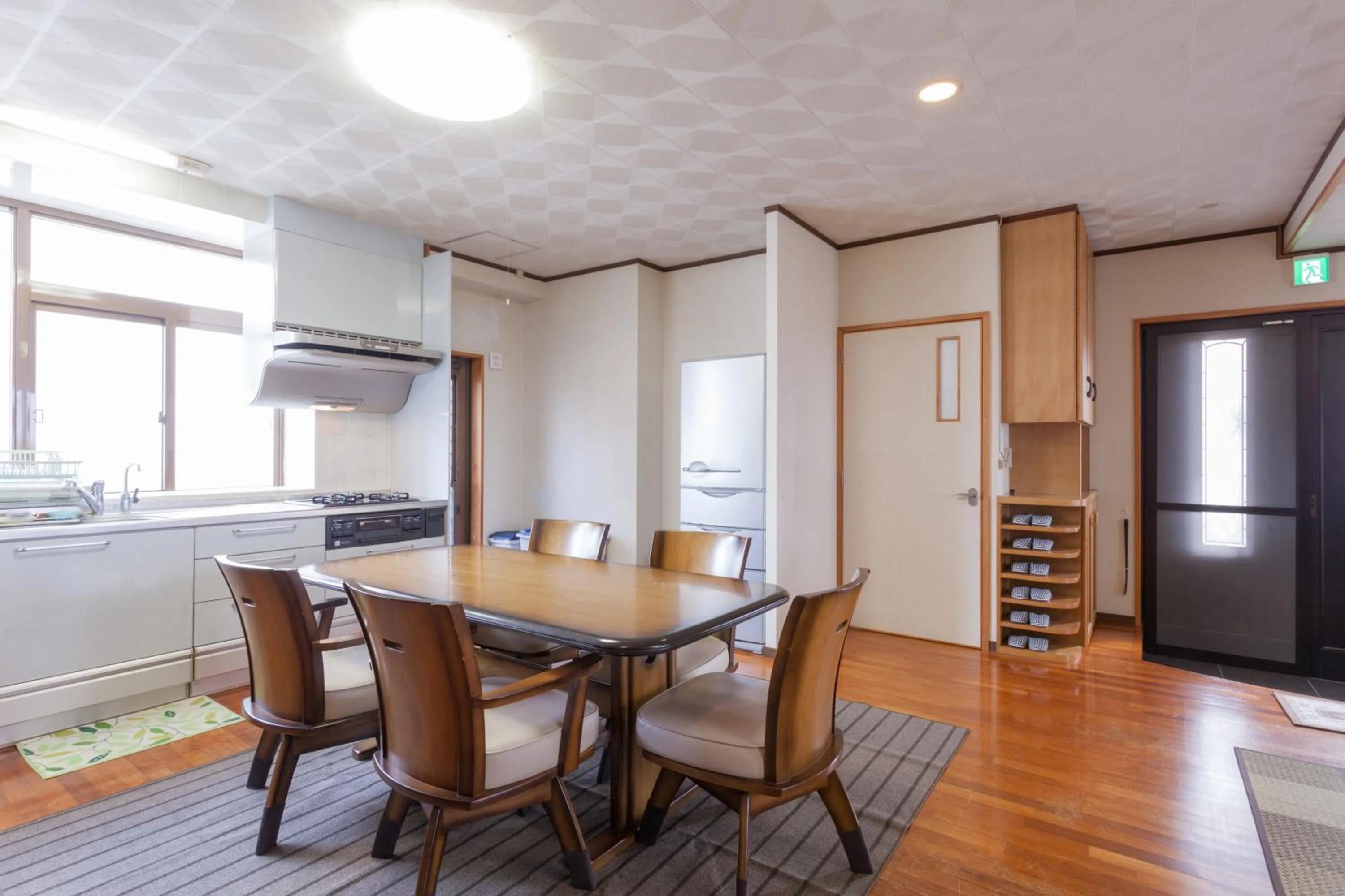 Kitchen or kitchenette in Kariyushi Condominium Resort Sea Side House