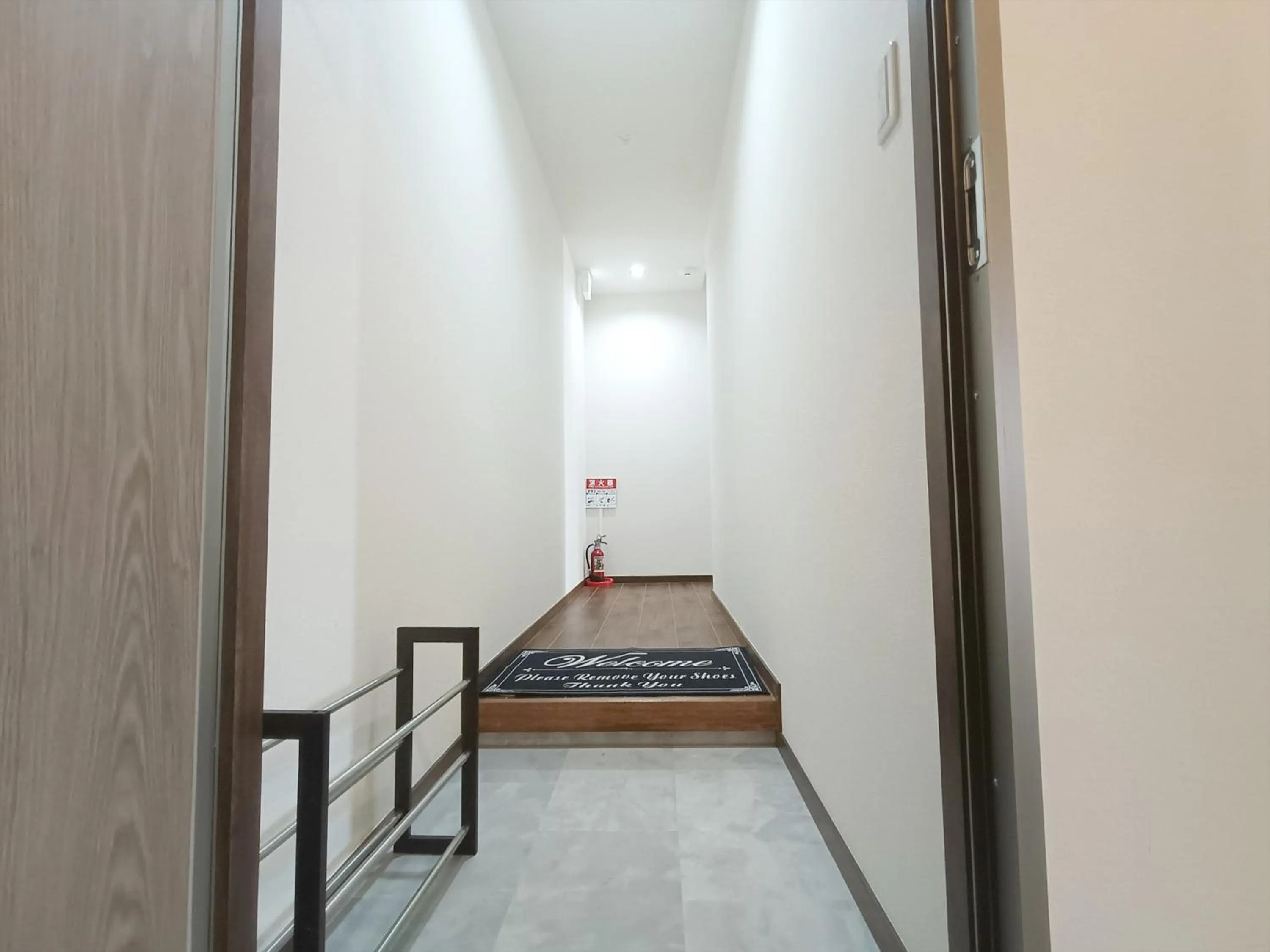 Bed in Kariyushi Condominium Resort Sea Side House