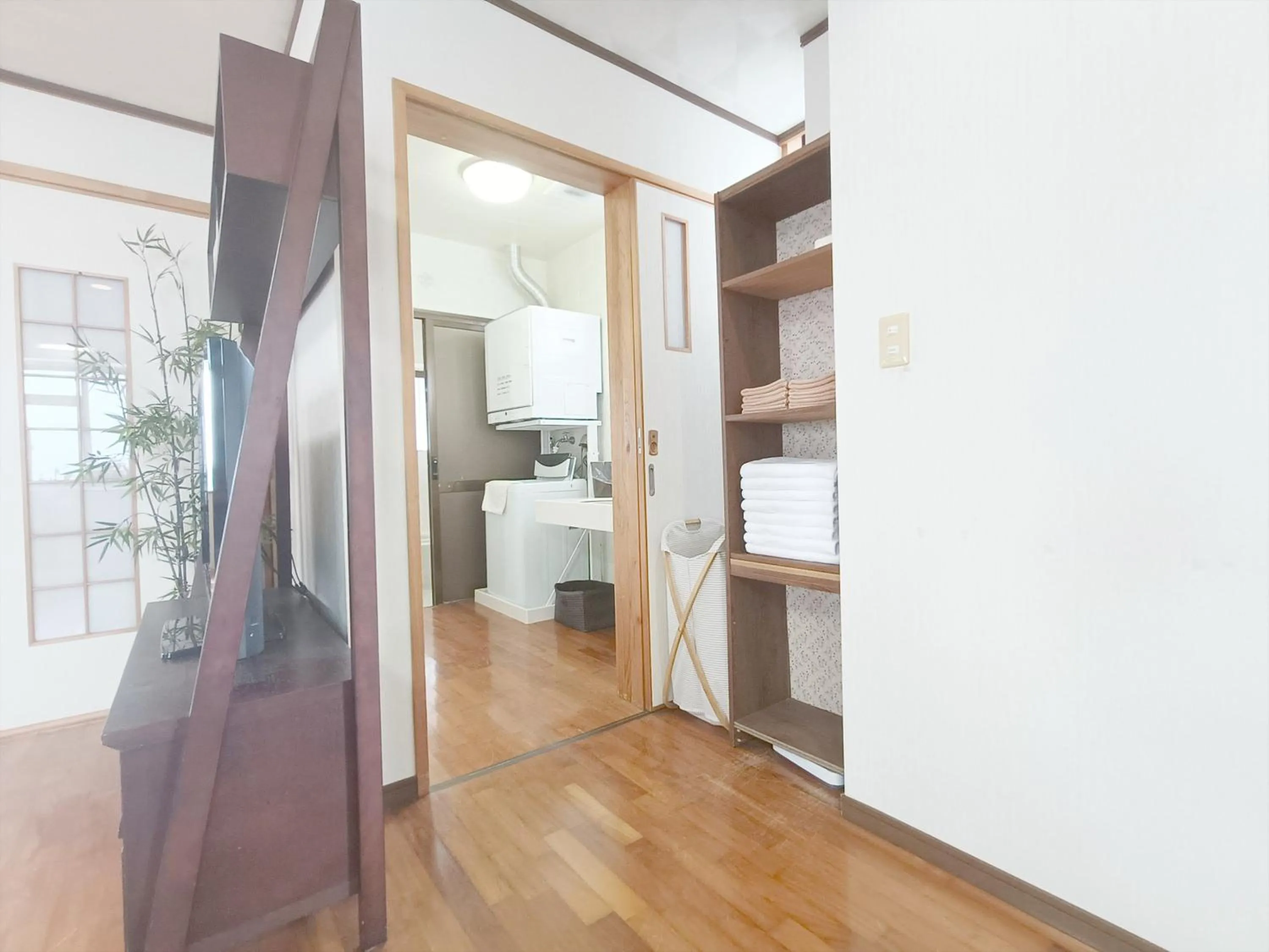 Bed in Kariyushi Condominium Resort Sea Side House