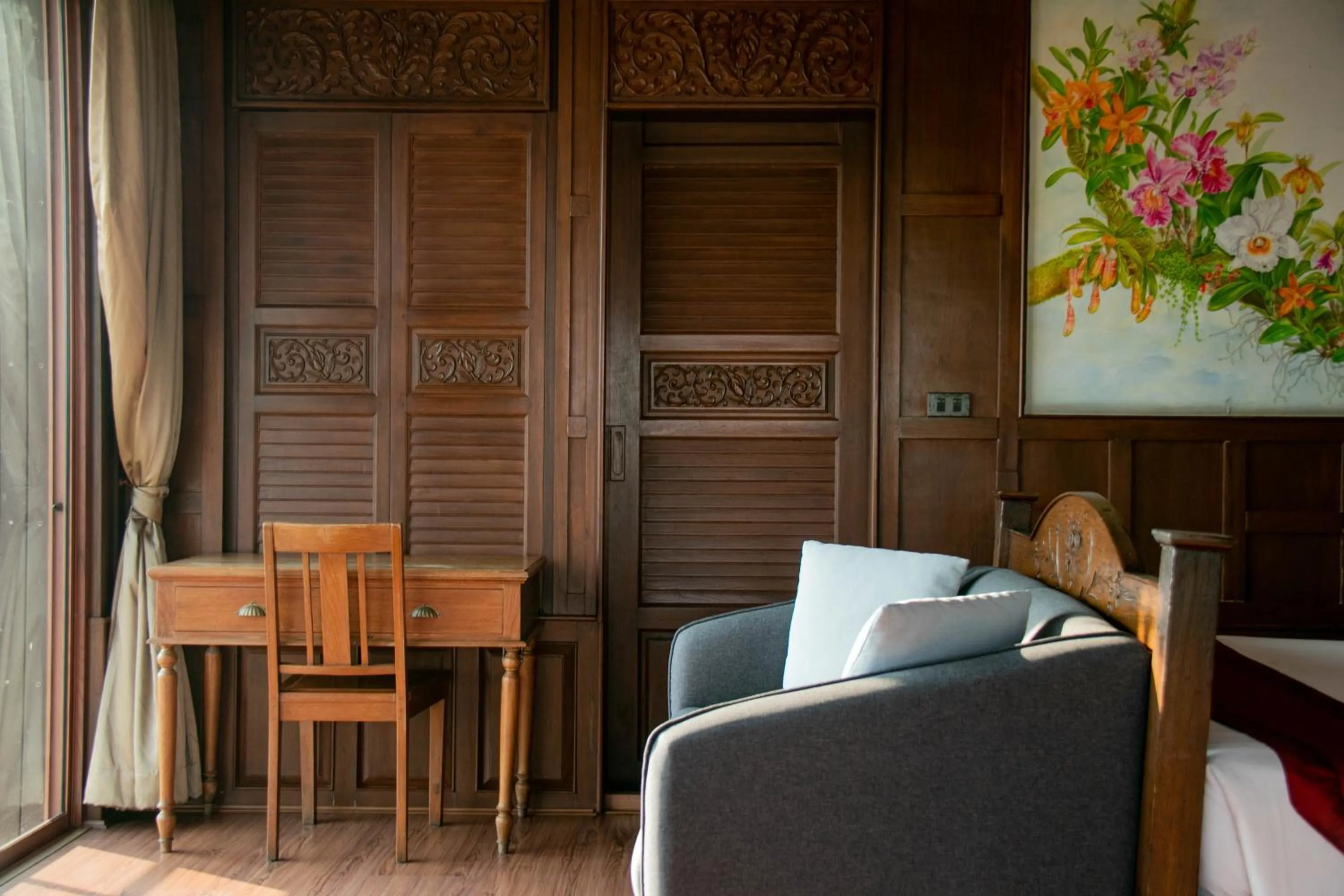 Living room in Lamphu Tree House Boutique Hotel