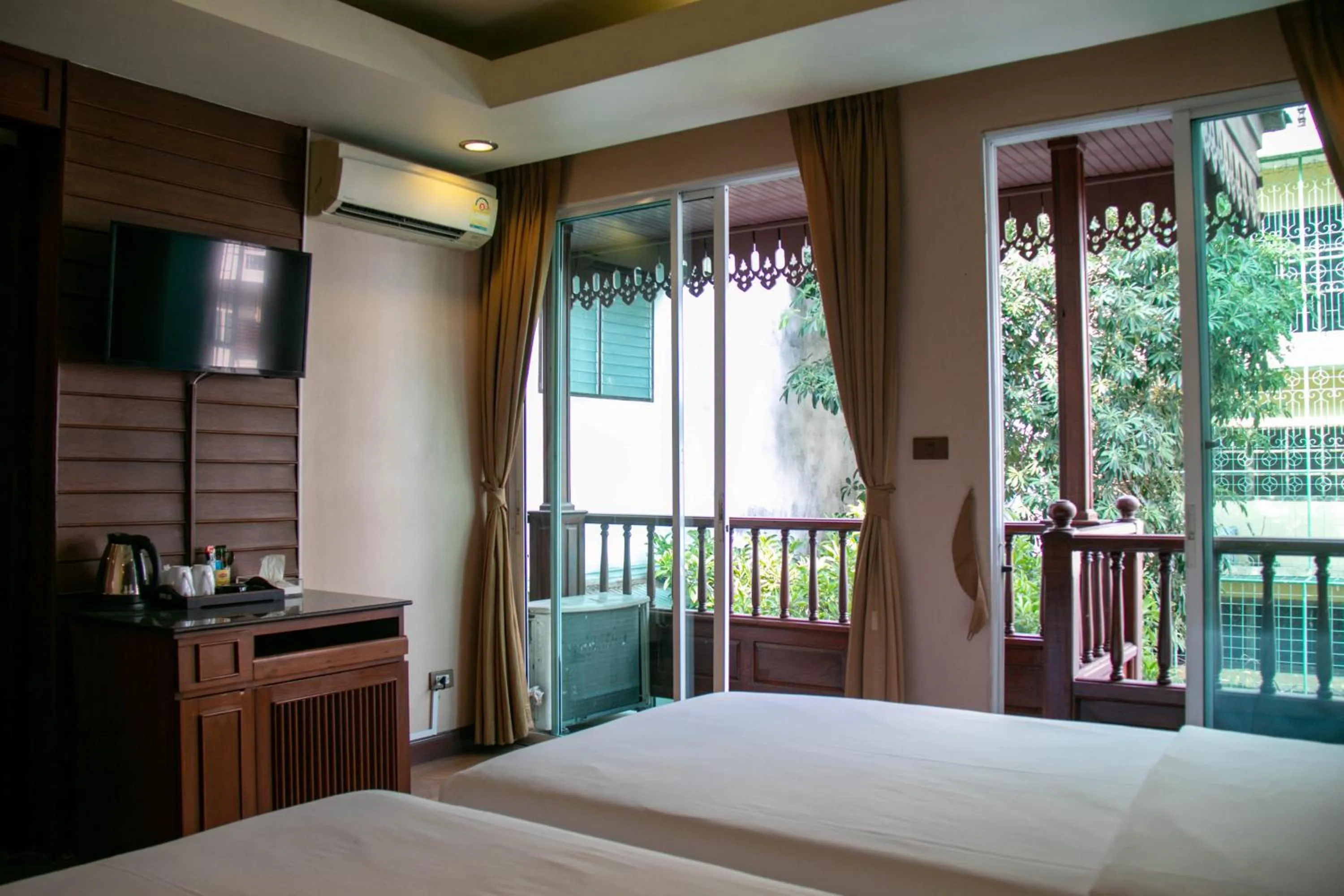 View (from property/room), Bed in Lamphu Tree House Boutique Hotel