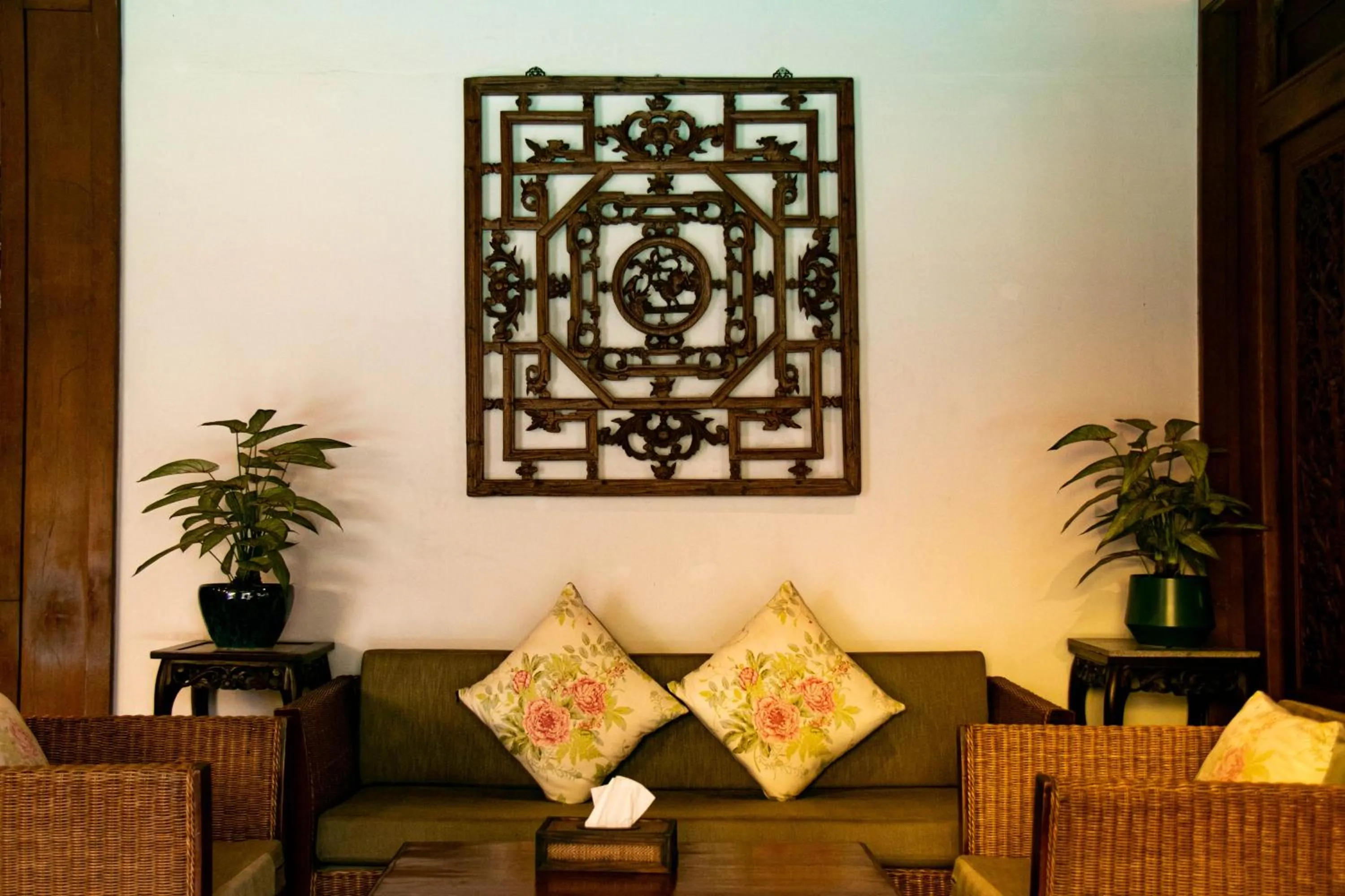 Seating area in Lamphu Tree House Boutique Hotel