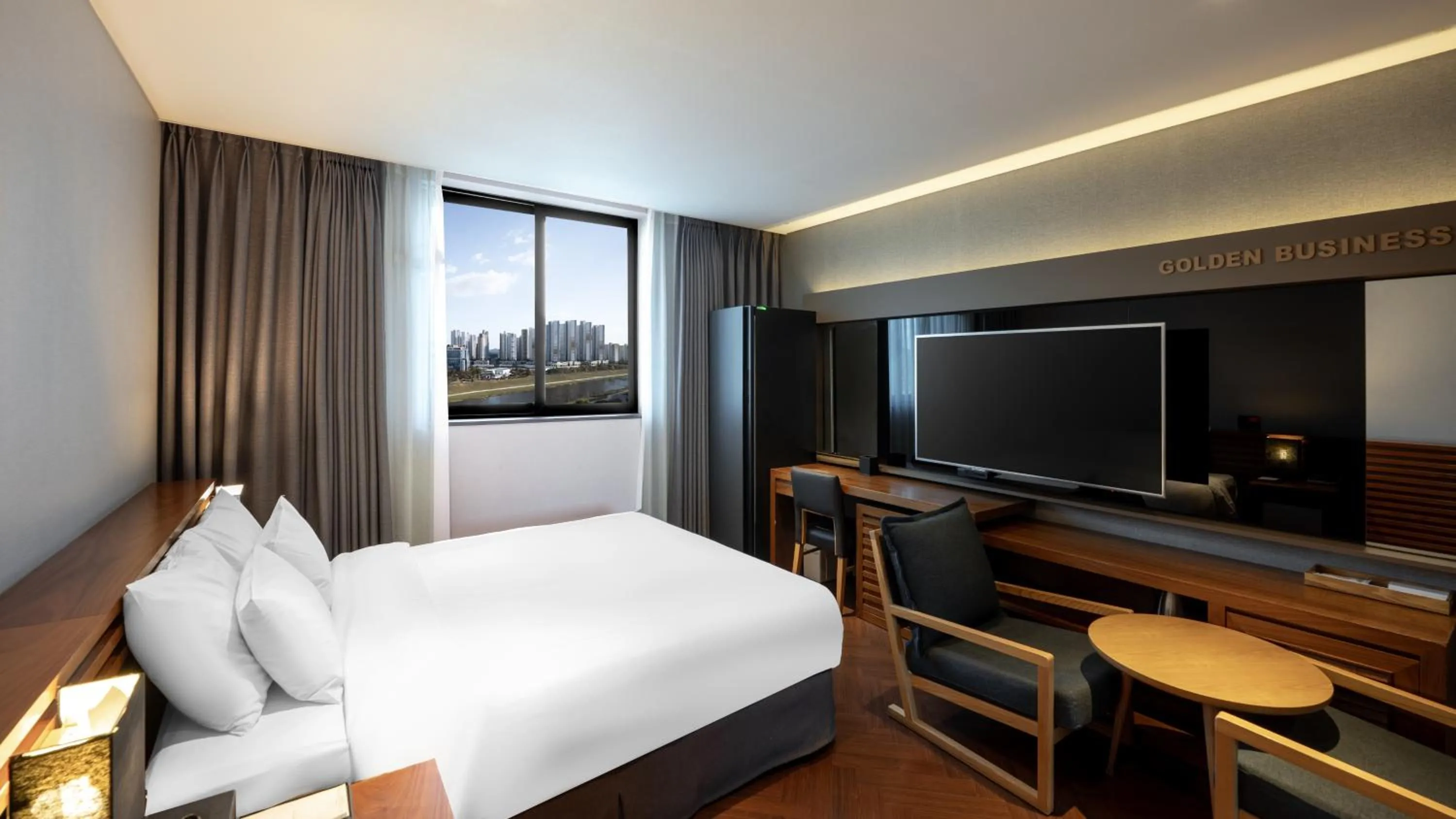 Bed in Golden Business Hotel