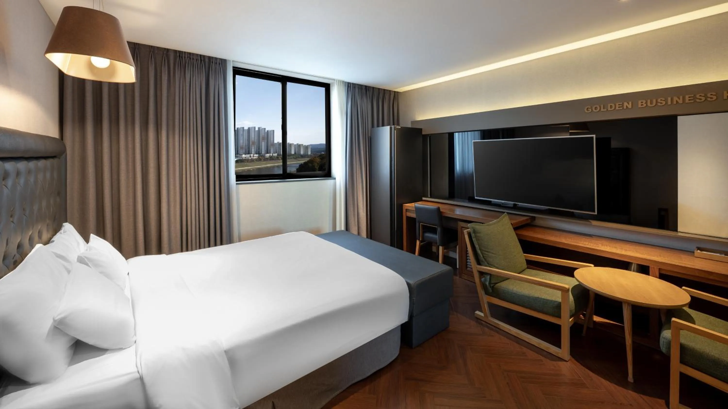 Bed in Golden Business Hotel