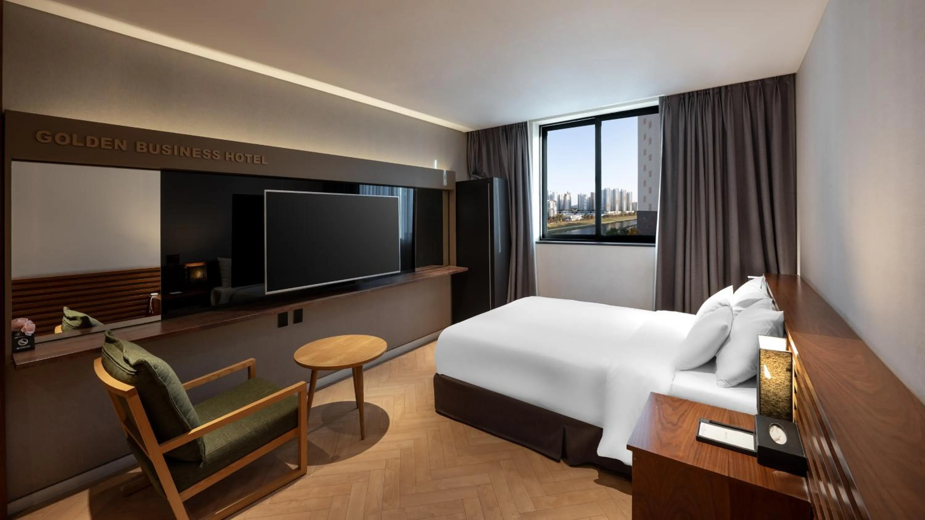 Bed in Golden Business Hotel