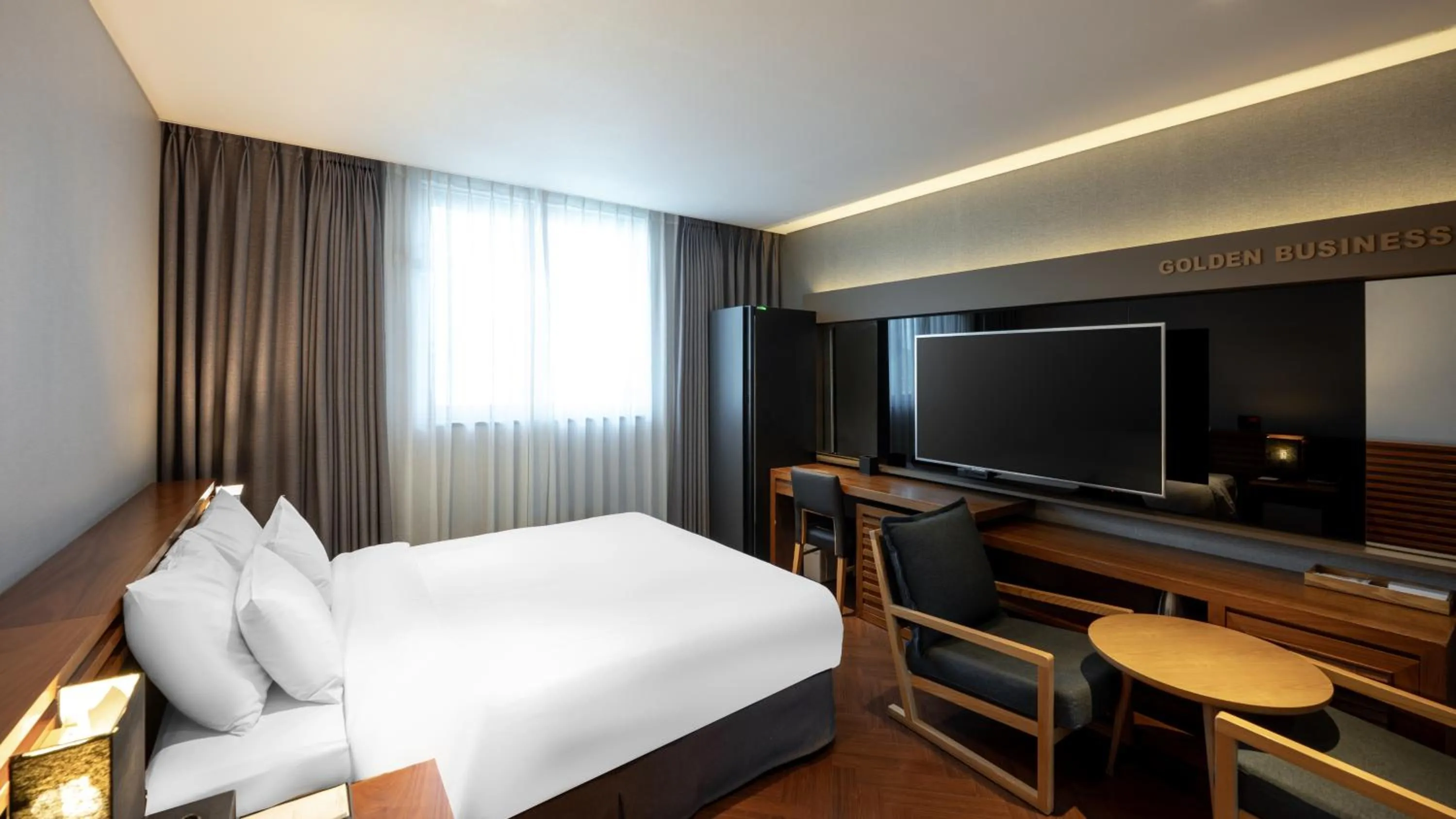 Bed in Golden Business Hotel