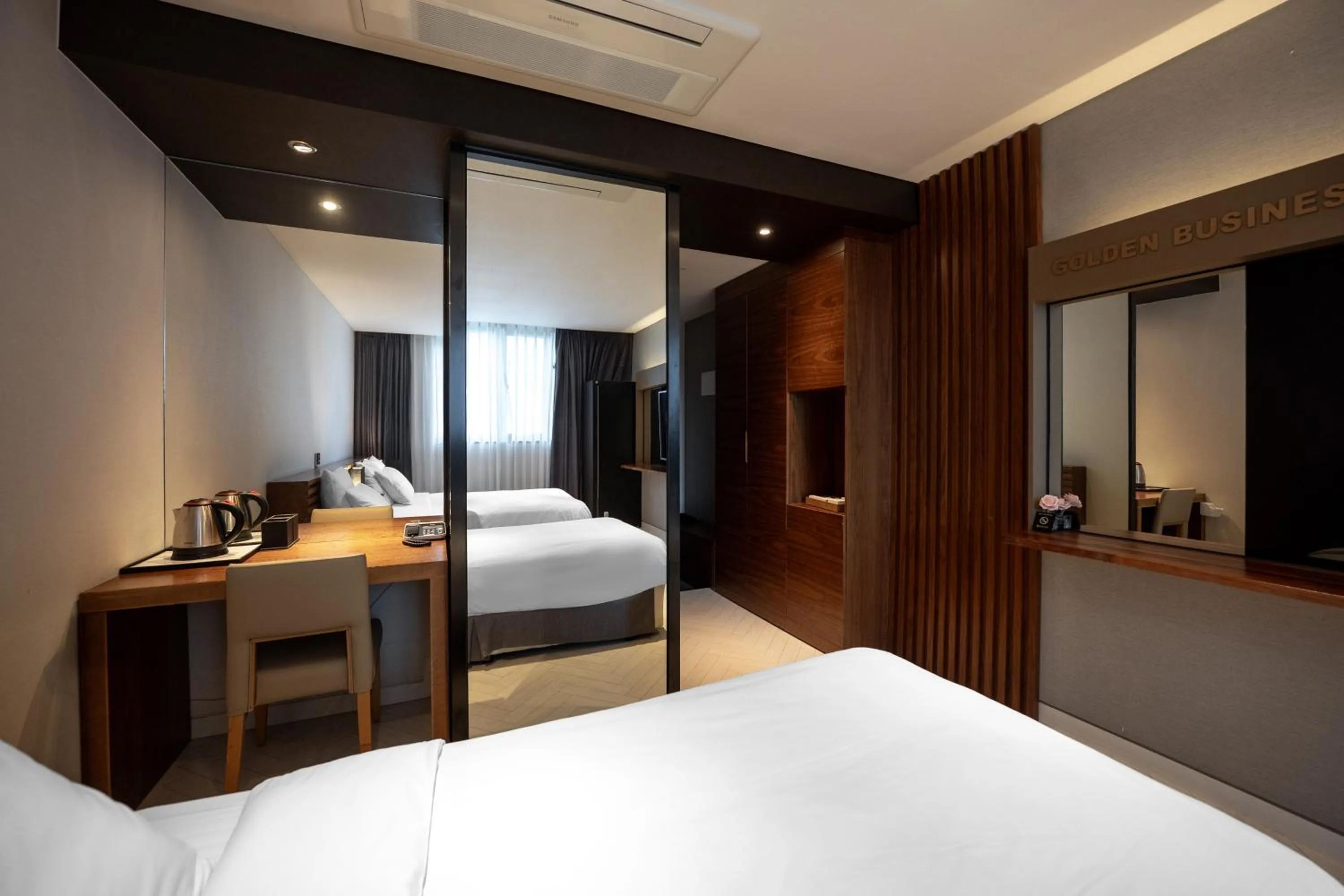 Bed in Golden Business Hotel