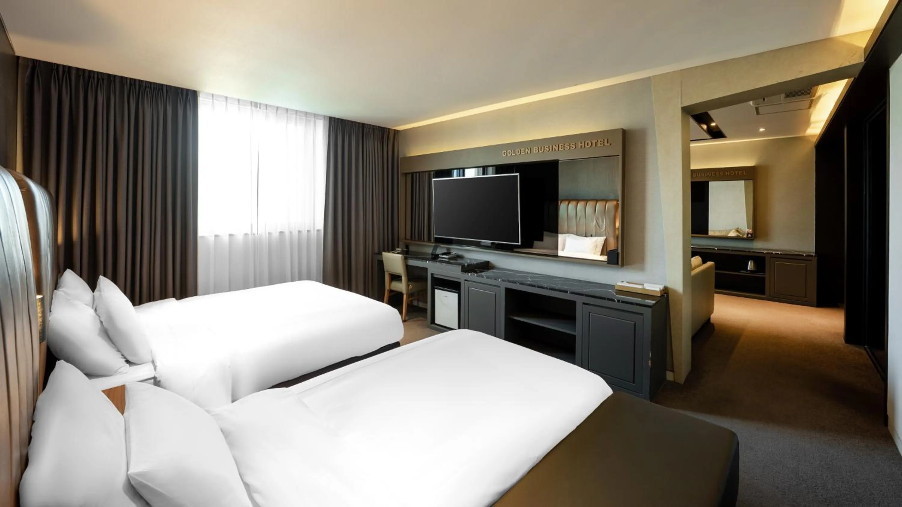 Bed in Golden Business Hotel