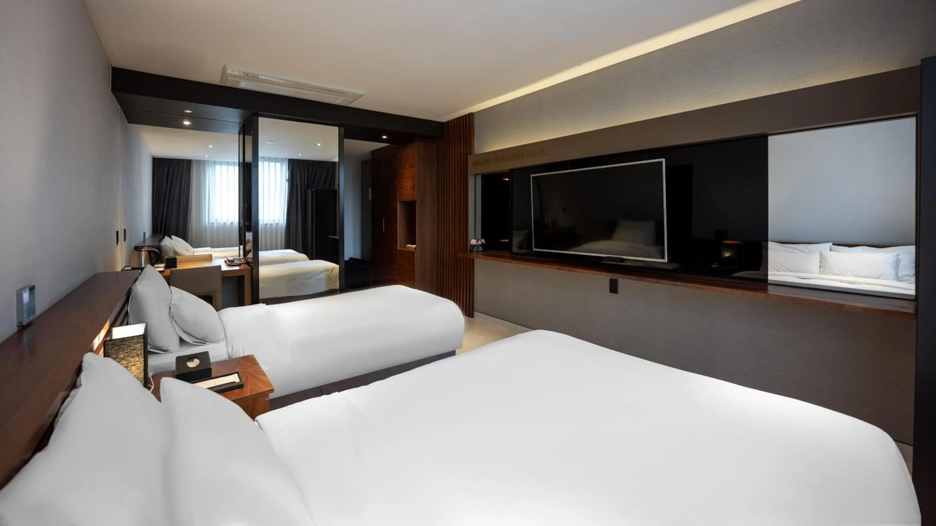 Bed in Golden Business Hotel