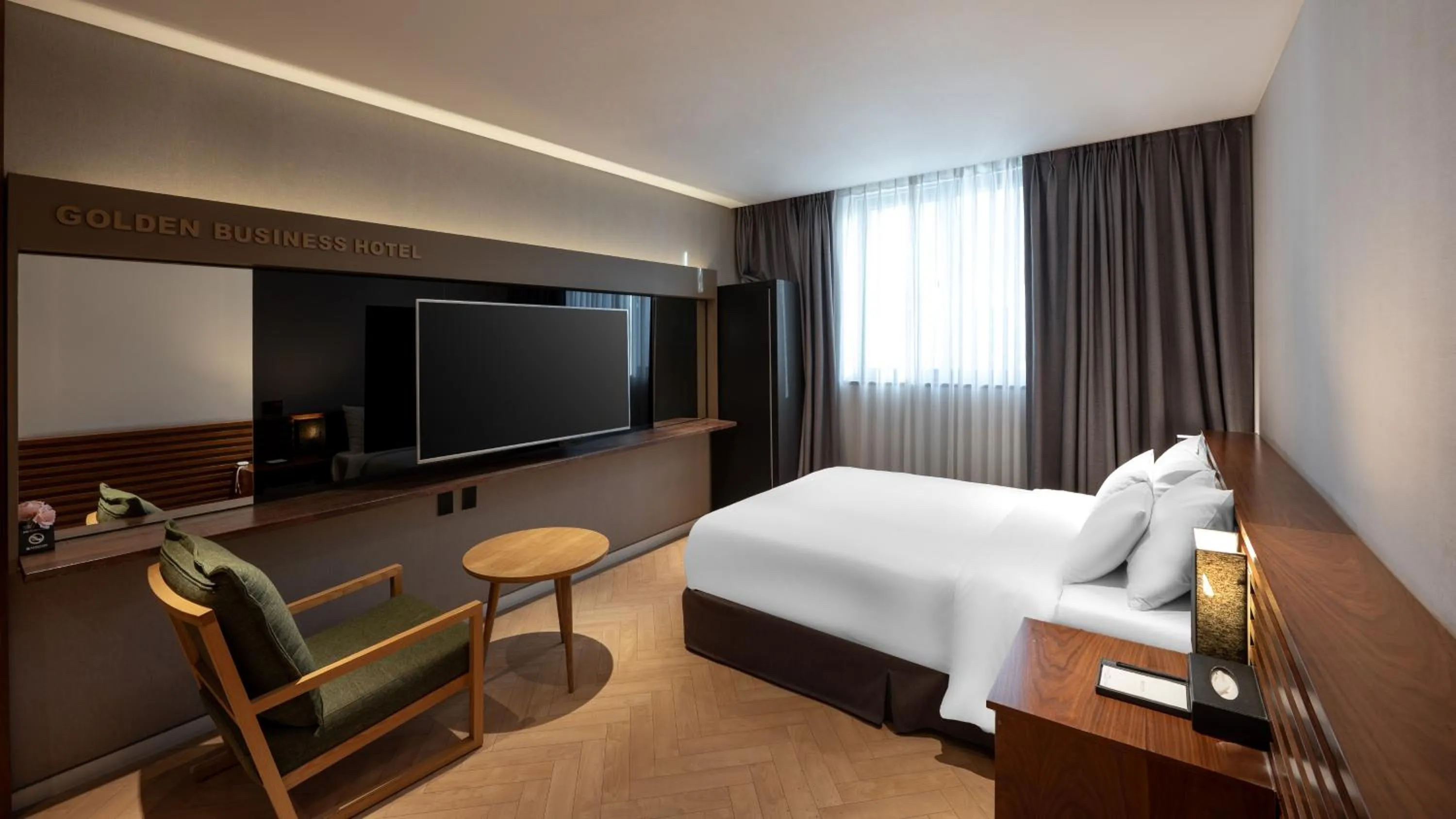 Bed in Golden Business Hotel