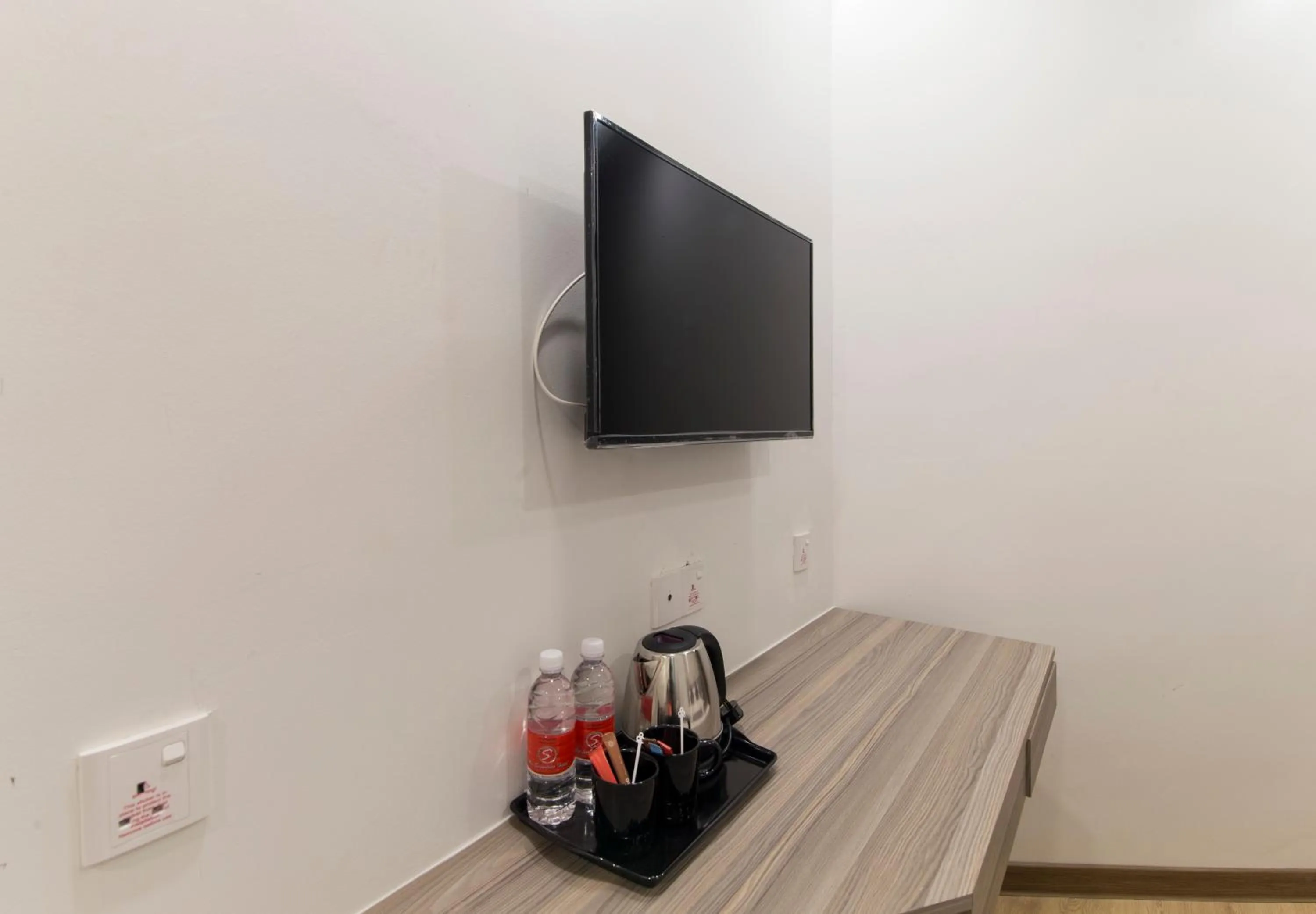 TV and multimedia in Signature International Hotel China Town