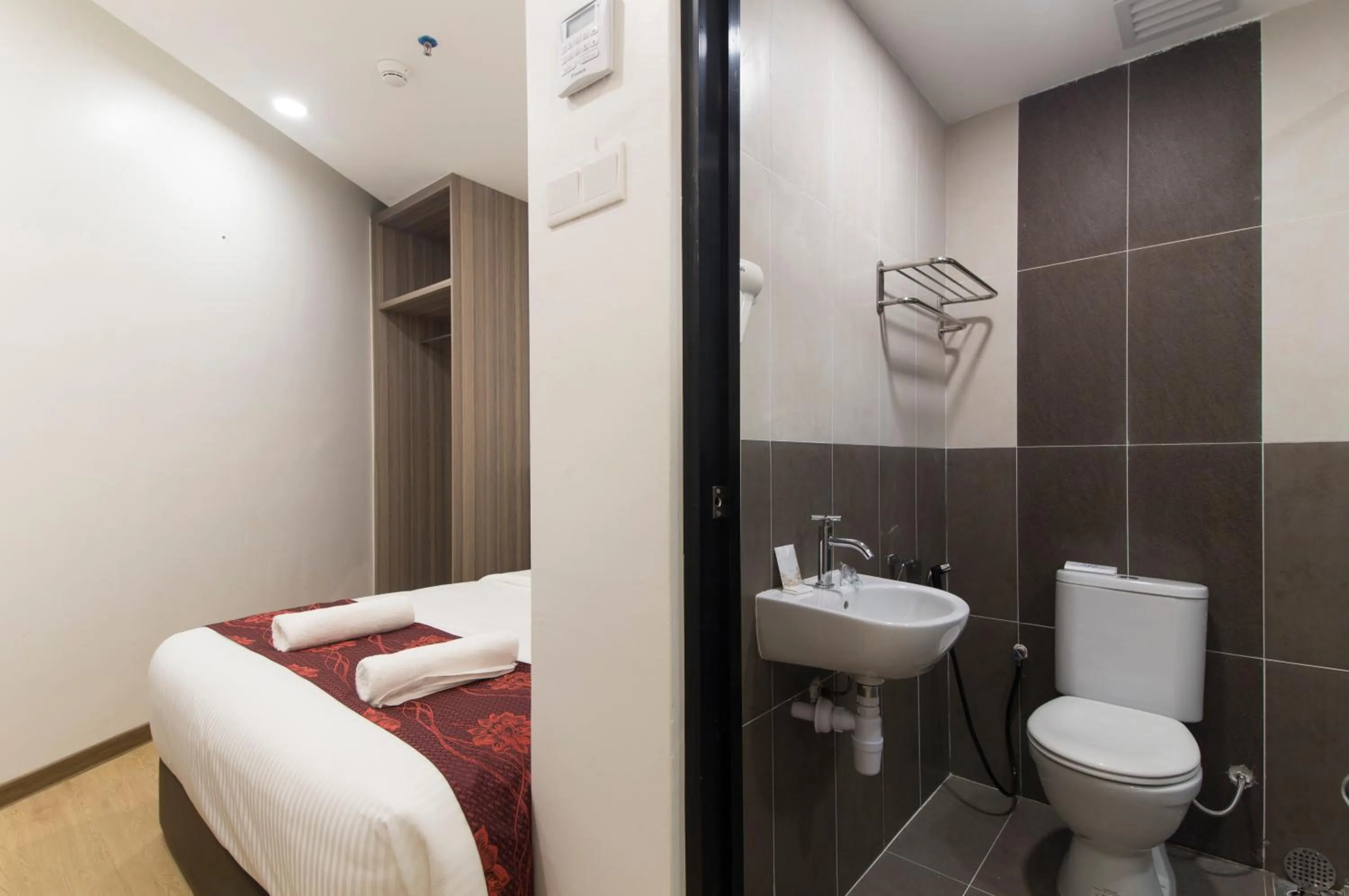 Bedroom in Signature International Hotel China Town