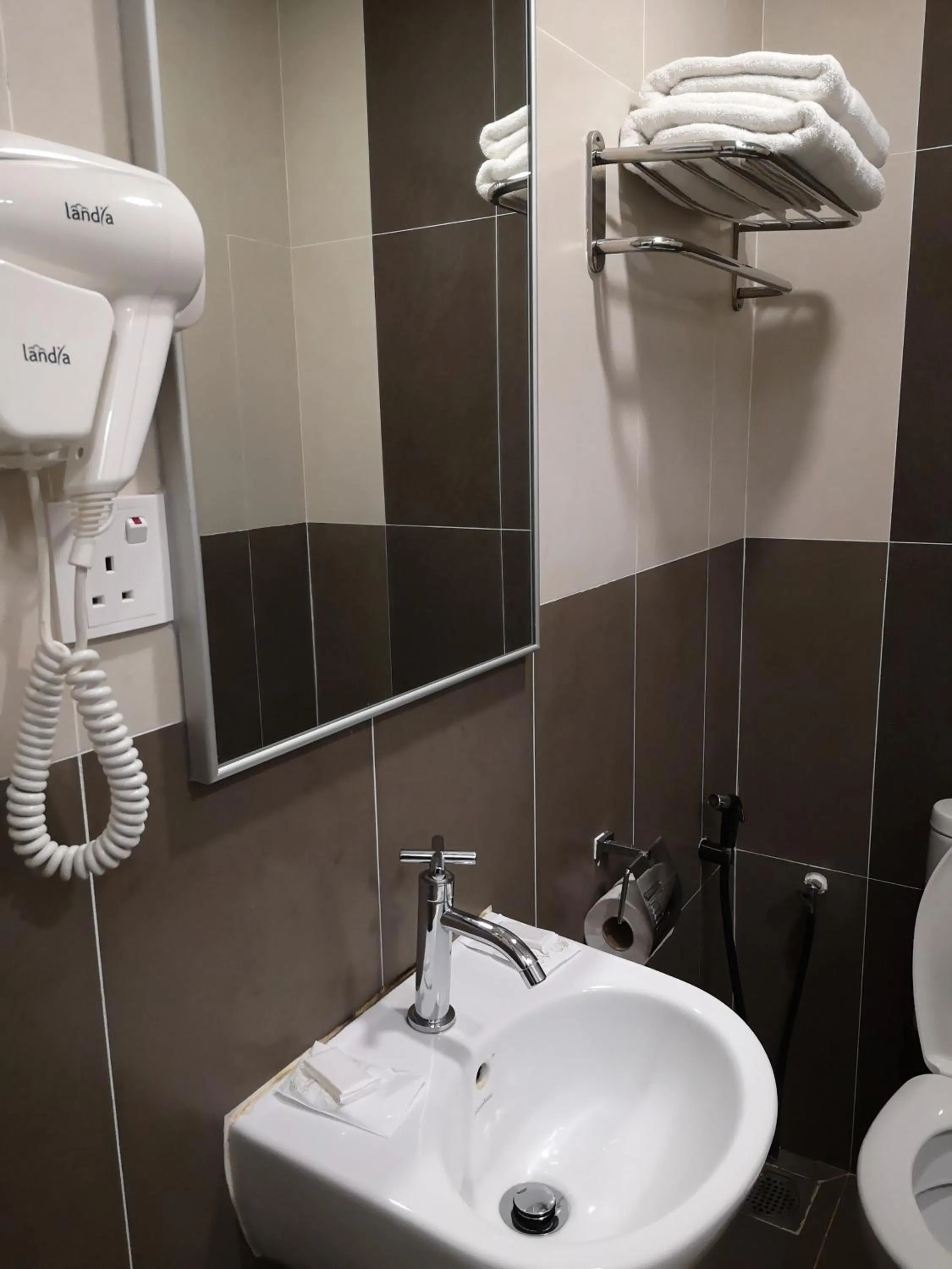 Bathroom in Signature International Hotel China Town