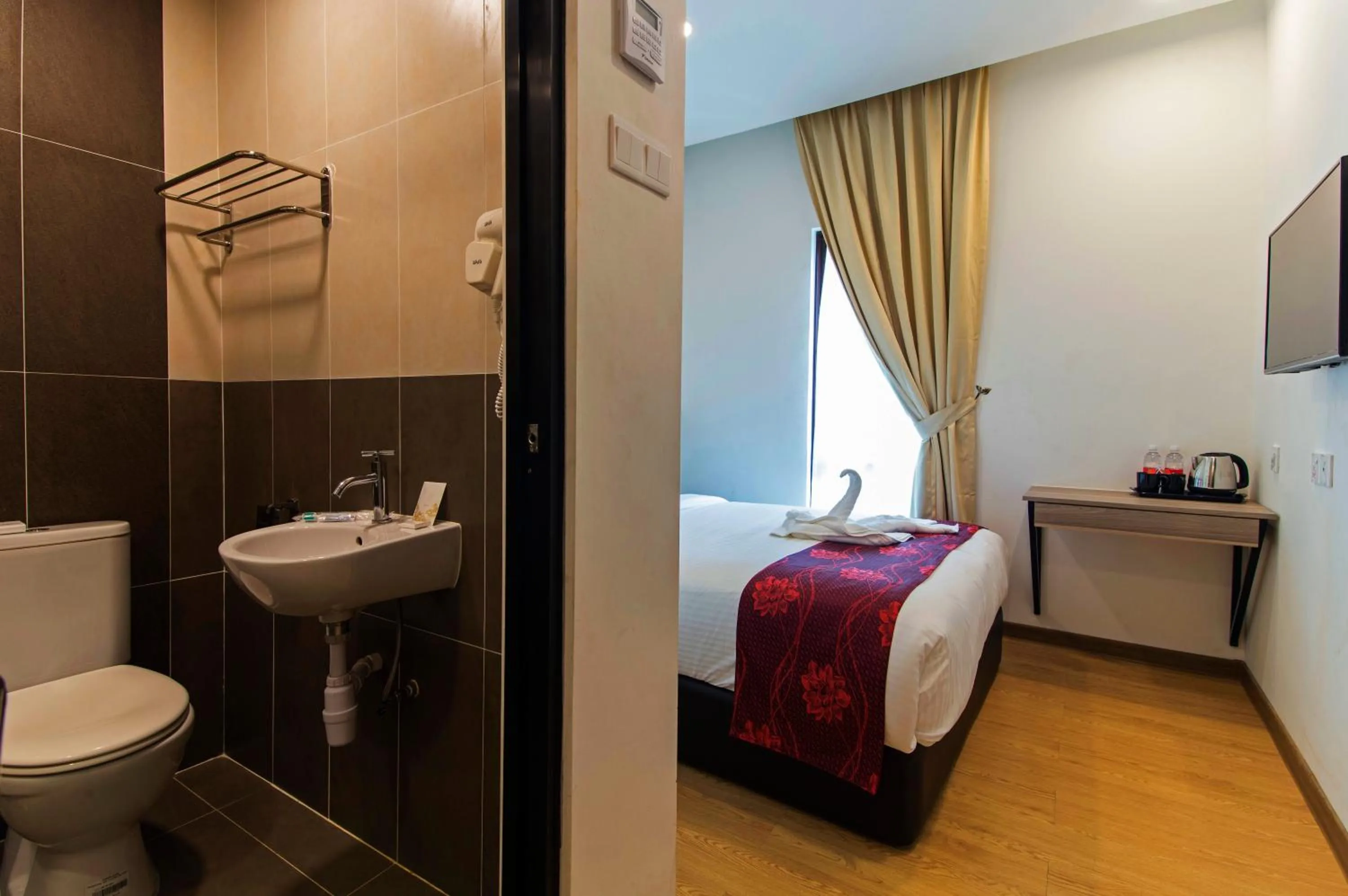 Bed in Signature International Hotel China Town