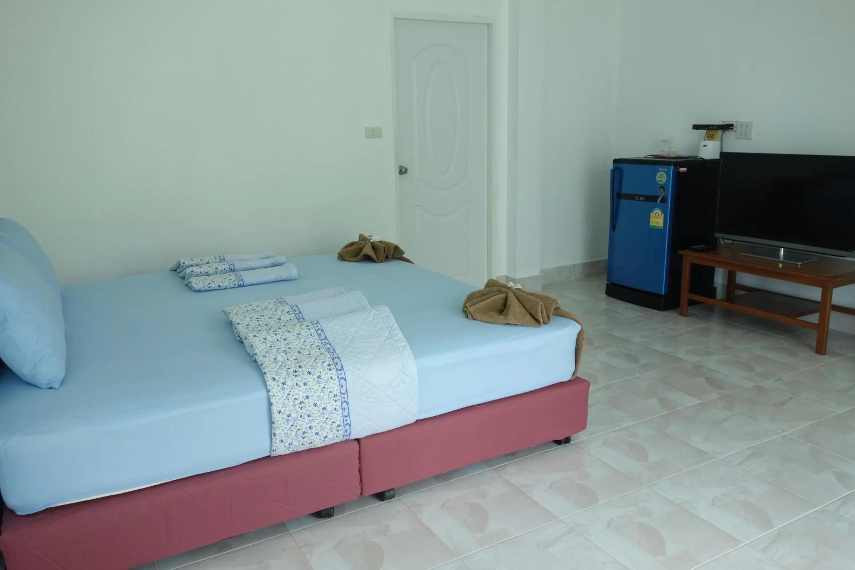 Photo of the whole room, Bed in Mook Ing Lay